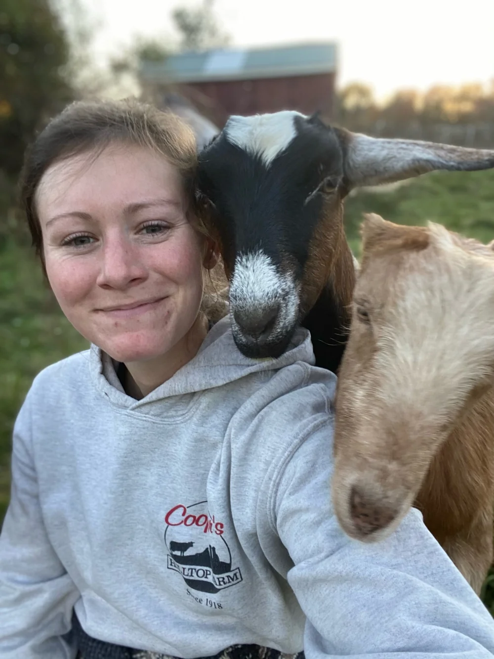The slower pace of winter affords daily snuggling time with goats. 