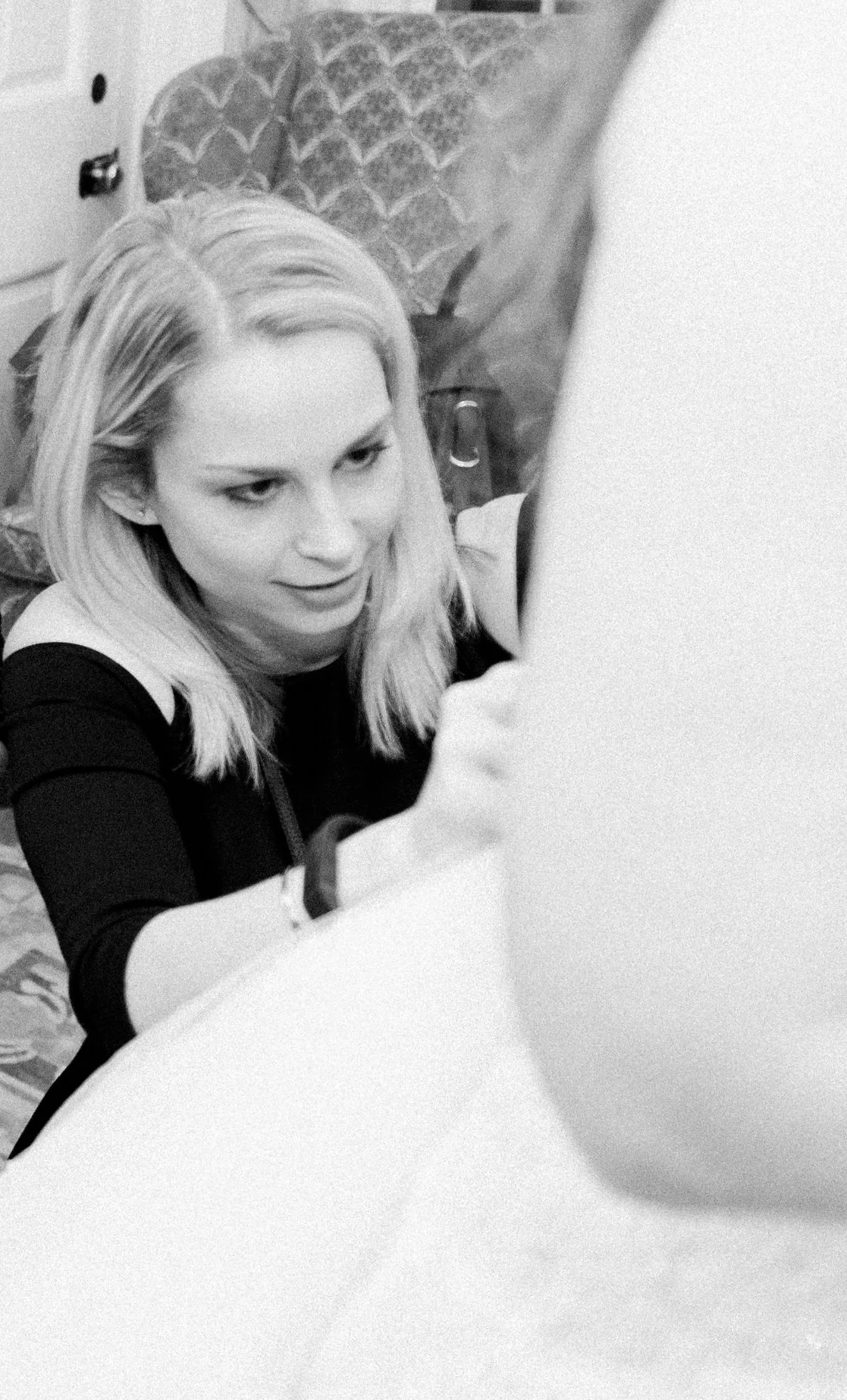 brielle-davis-events-joy-michelle-photography-brielle-adjusting-bustle.jpg