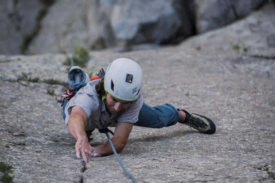 Austin Rust from North Dakota cranks up the first pitch of “One Way Sunset” (5.10C). Shooting up the Northwest face of Devils Tower, the crack provides one of the best finger cracks in Eastern Wyoming.