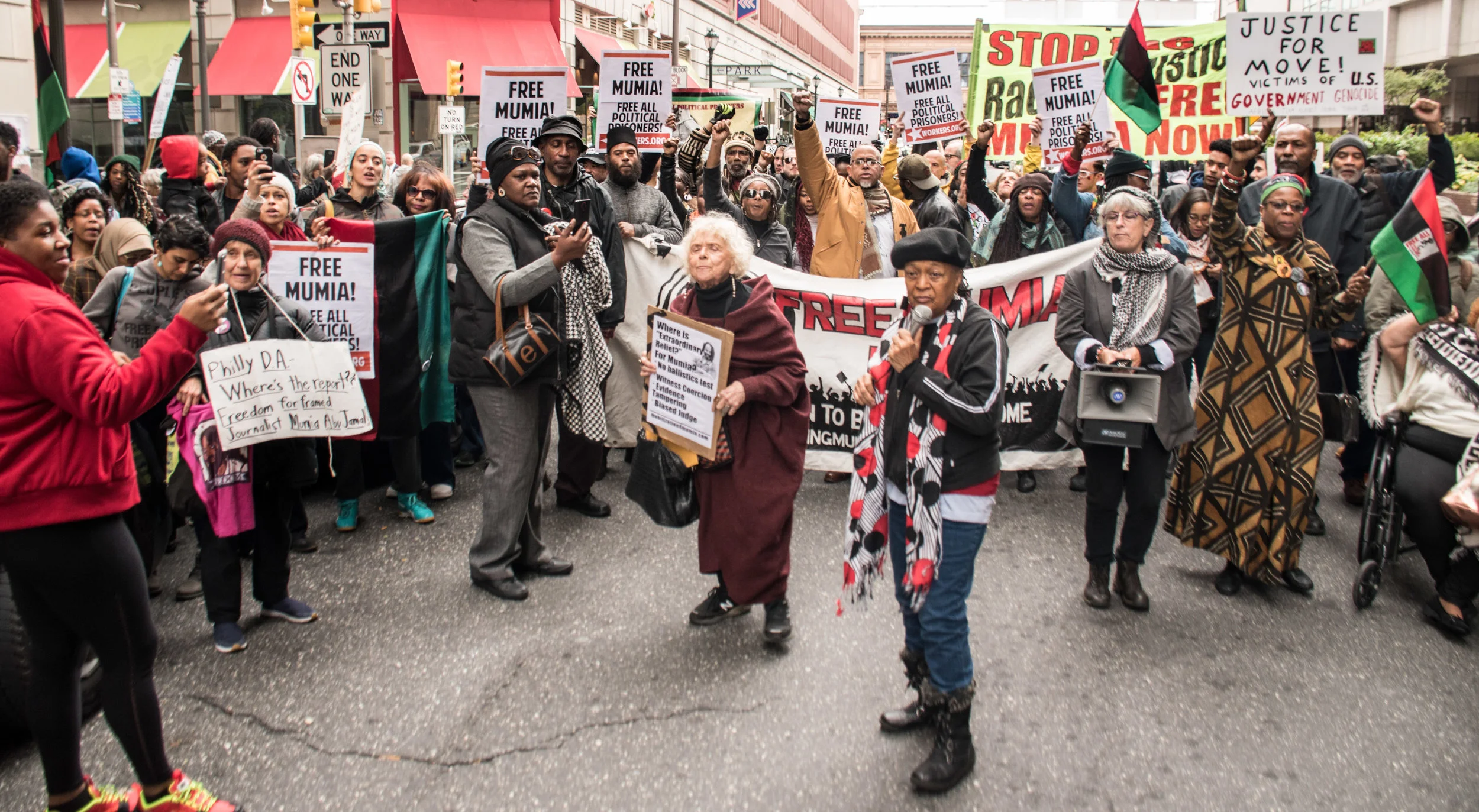 Mumia supporters take the street following a Oct 29, 2018 court hearing.