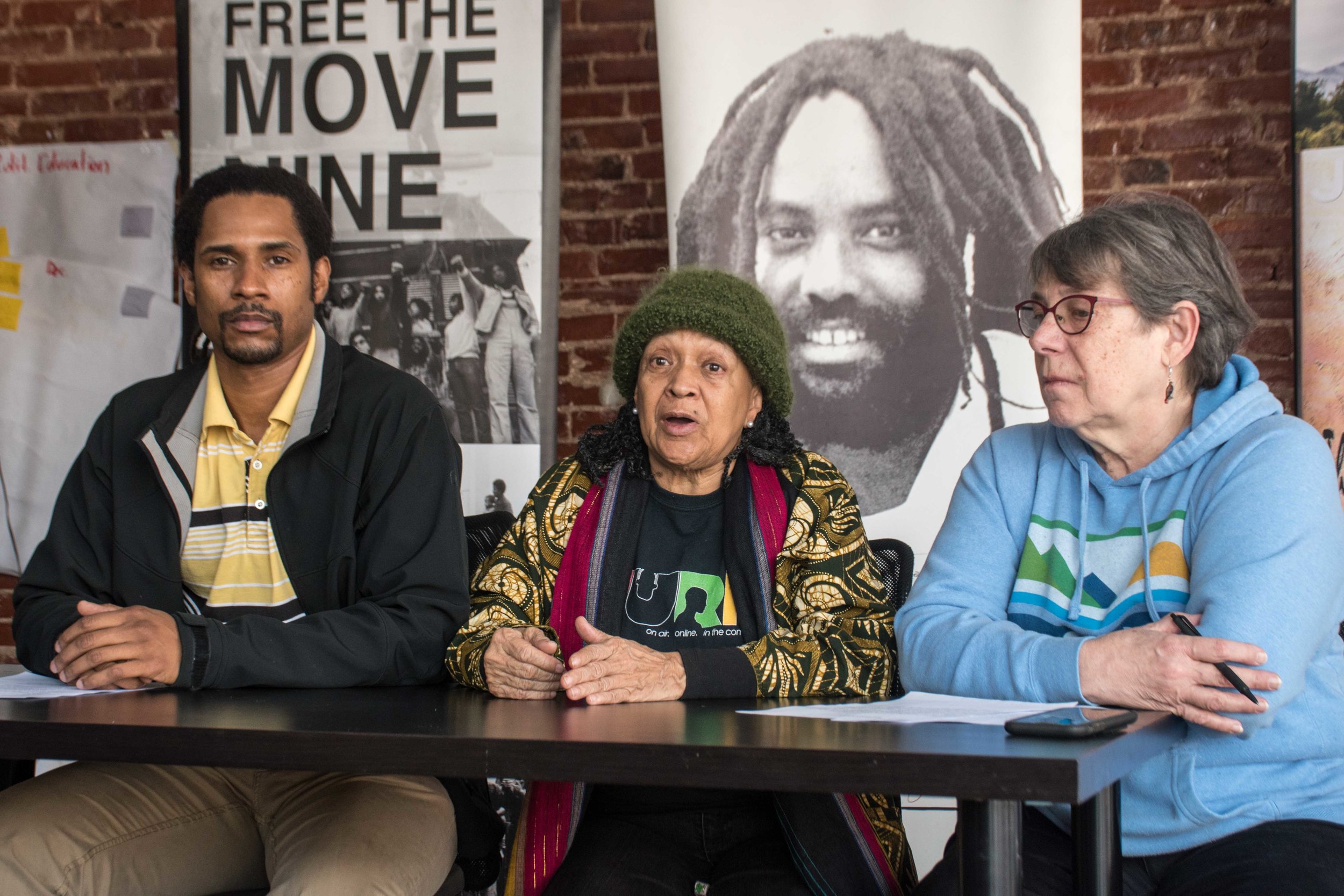 2.2.19 Philadelphia - Press Conference describes the significance of the Feb 1 dis-invitation of Philadelphia District Attorney Larry Krasner by the Rebellious Lawyering (RebLaw) conference at Yale University. Video to be posted soon.  L to R: Mike Africa Jr (MOVE Organization), Pam Africa (International Concerned Family and Friends of Mumia Abu-Jamal), Betsey Piette (Mobilization4Mumia)