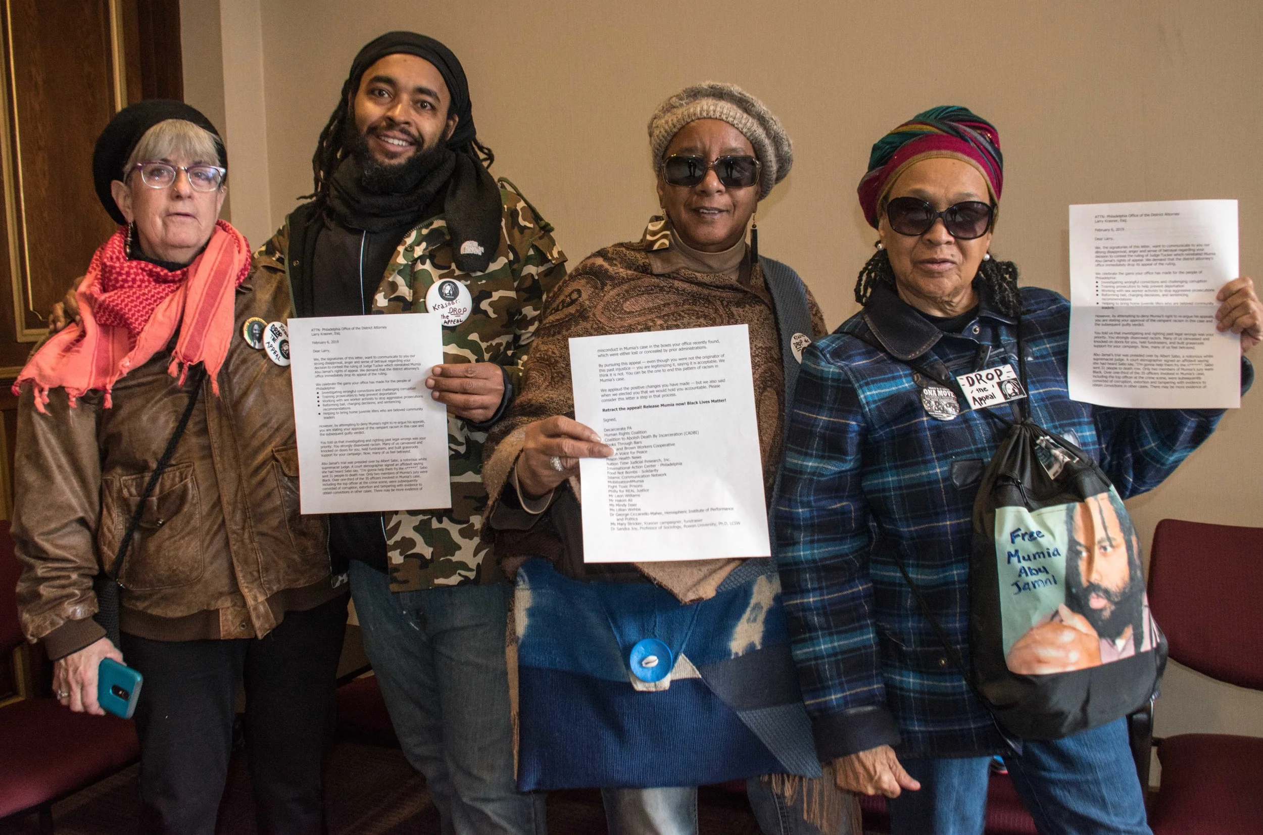 Philadelphia, Feb 6 - A letter to Philly DA Larry Krasner was delivered to his office on Feb 6 by L to R) Cindy Miller, Wayne Cook (Mumia Abu-Jamal's nephew), Linda Ragin, Pam Africa and Joe Piette (behind camera)