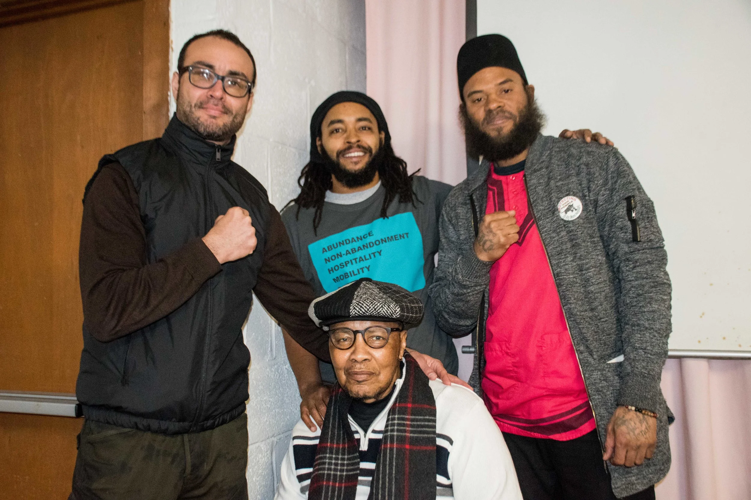 Feb 23, Darby, PA - (L to R) Robert Saleem Holbrook, Keith Cook, Wayne Cook, Wali Akbar El pose after speaking on a panel at Mumia Day (Darby Community Black History Month Program)
