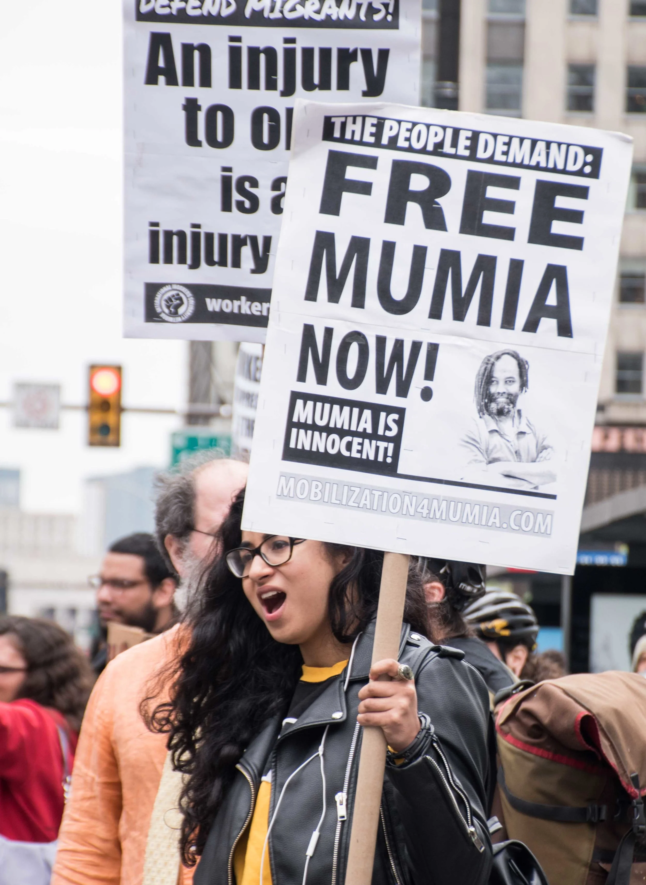 Free Mumia signs at Philly May 1st International Workers Day march. Photo Credit: Joe Piette