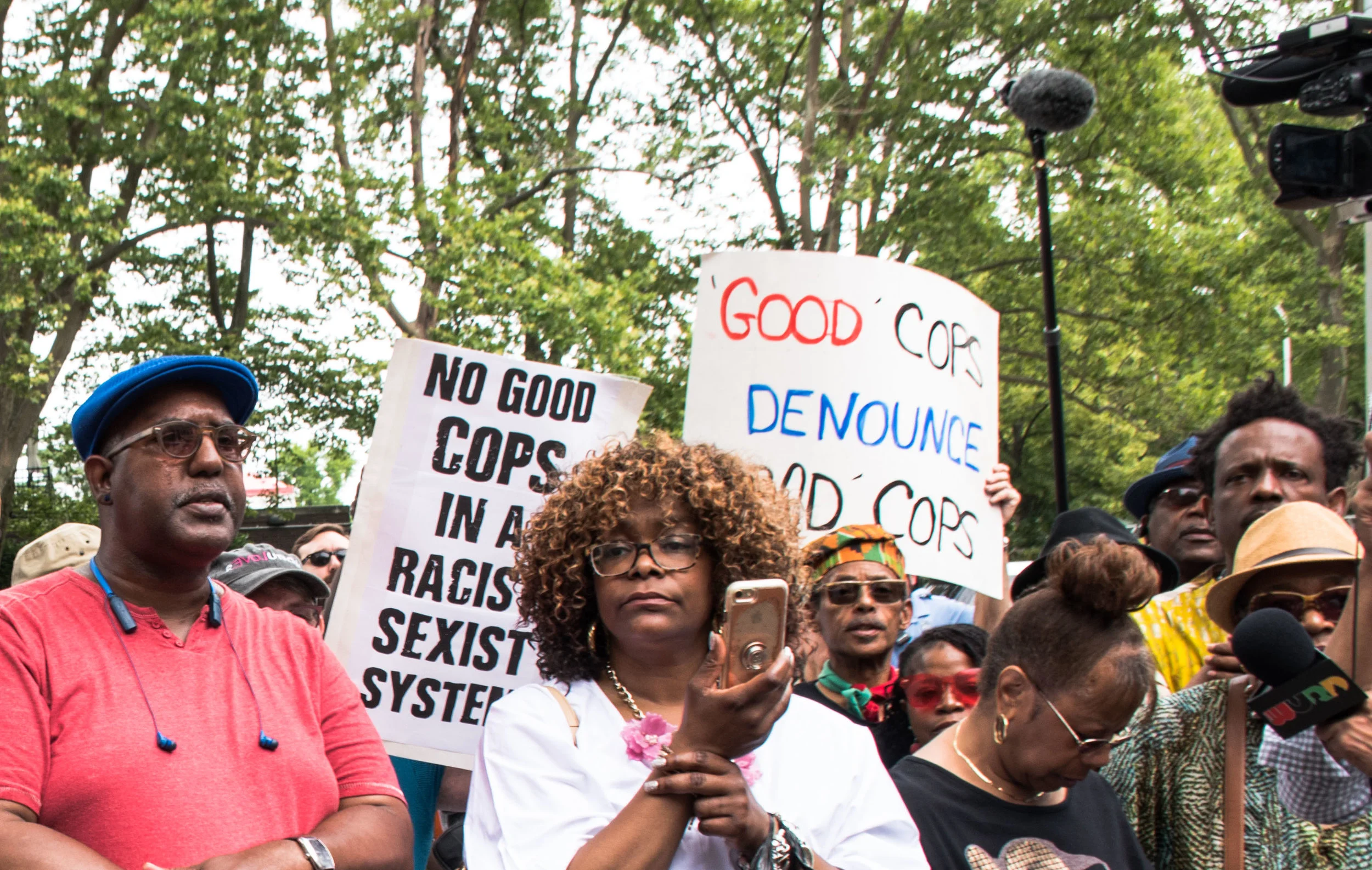 At the June 7 protest against the 328 Philly cops who posted vile racist, homophobic, sexist and Islamophobic comments on social media, 150 people heard speeches and chanted. When a speaker led the chant “Off the streets” calling for cops to be given desk duty, some people chanted “Off the payroll.” At one point during the hour-long rally, some participants chanted “Free the MOVE 9” and “Free Mumia.” Photo above reveals diverse views present - the majority of the crowd was above forty years old and were moderate in their demands. Some participants however called for the firing of the guilty cops and even abolishing the police.  Photo: Joe Piette