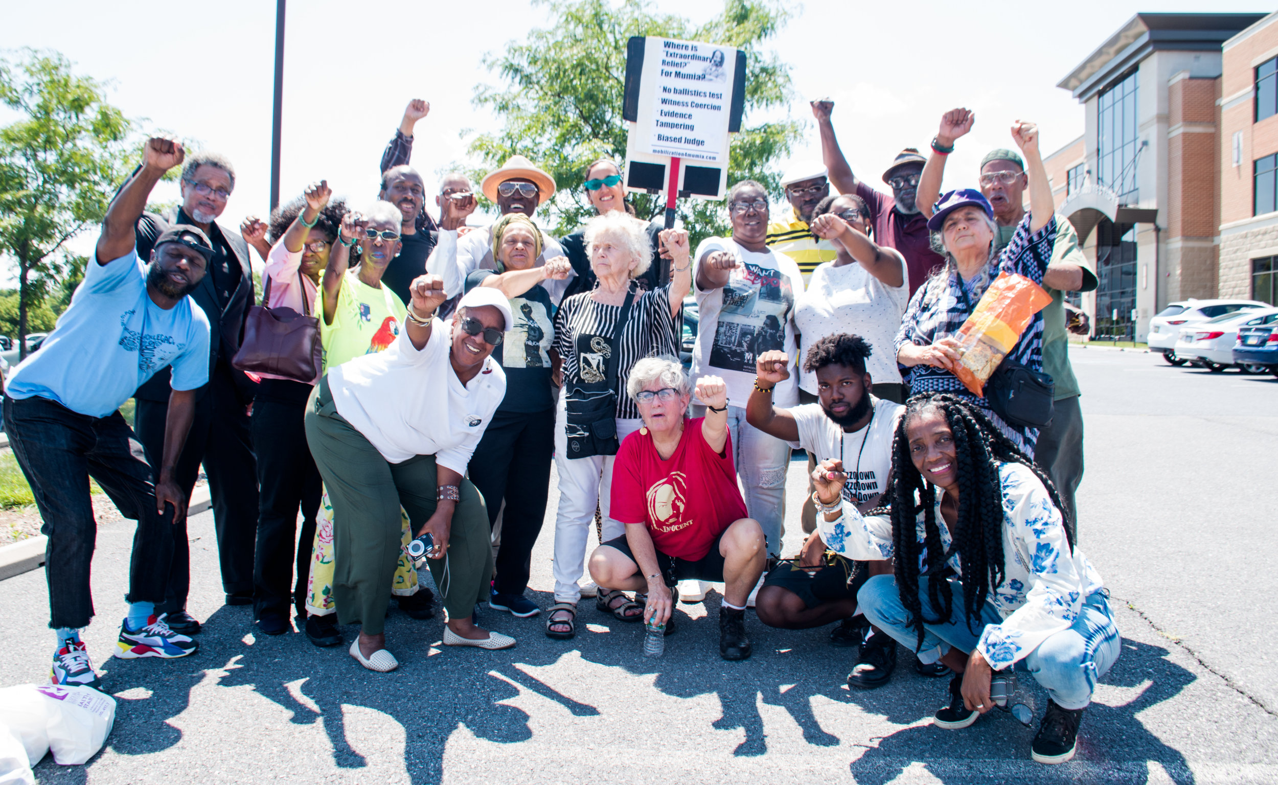 Mumia supporters gather together on July 24, outside PA Department of Corrections HQ in Mechanicsburg, PA. Photo credit: Joe Piette