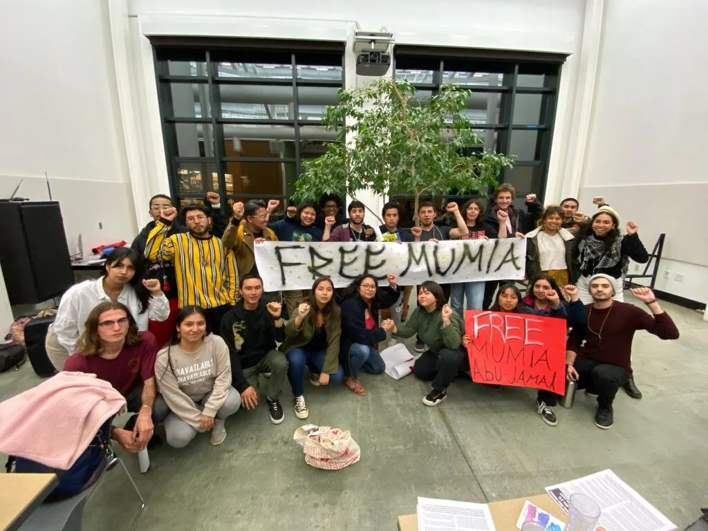Striking graduate students at UC Santa Cruz express their solidarity with Mumia Abu-Jamal, who is also taking courses there from his prison cell at SCI Mahanoy in Pennsylvania. On Feb 28, UCSC officials fired 54 of them!