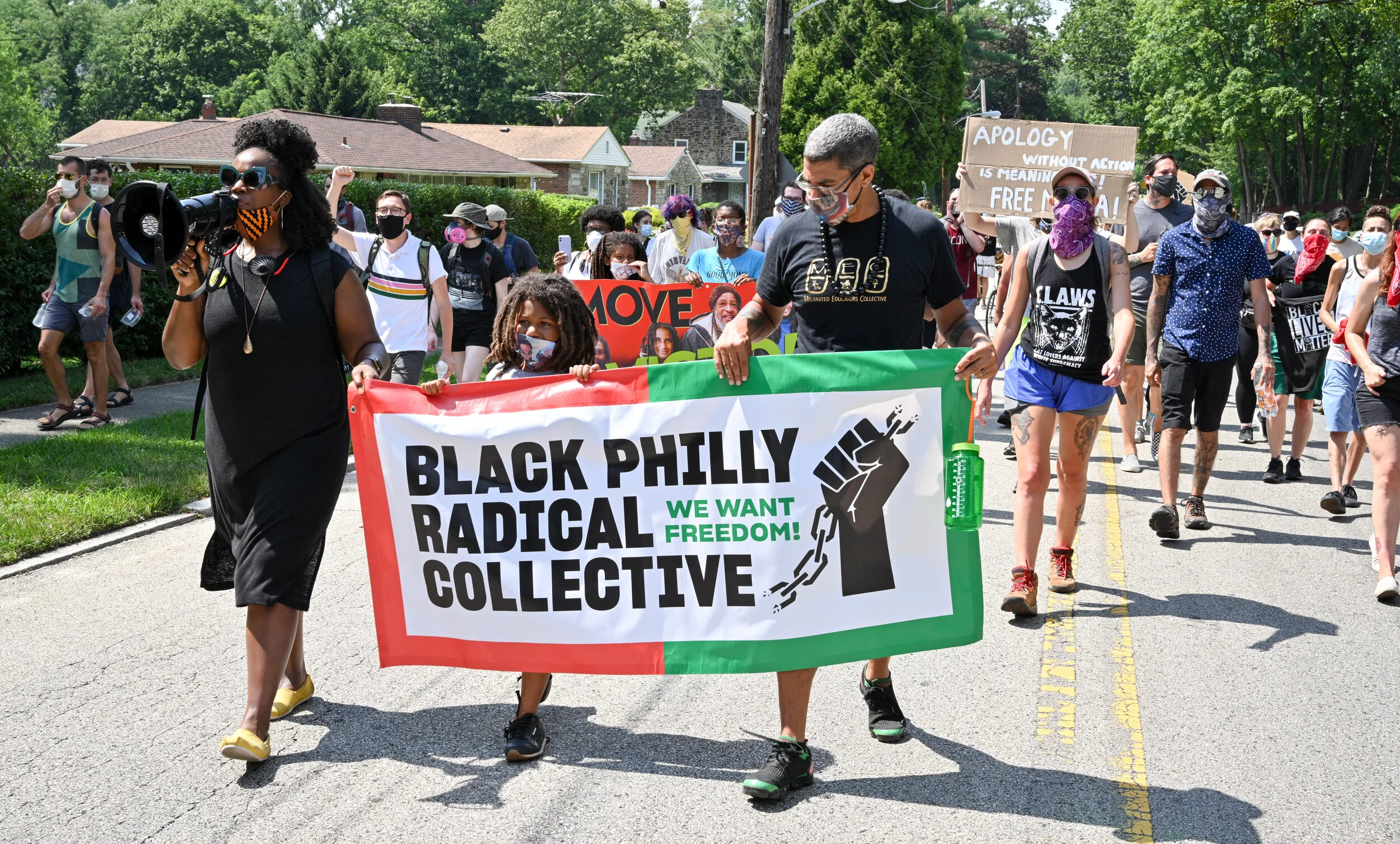 July 19 march demanding removal of street sign honoring mayor responsible for bombing of MOVE in 1985. More photos can be viewed at https://www.flickr.com/photos/109799466@N06/albums/72157715161916218