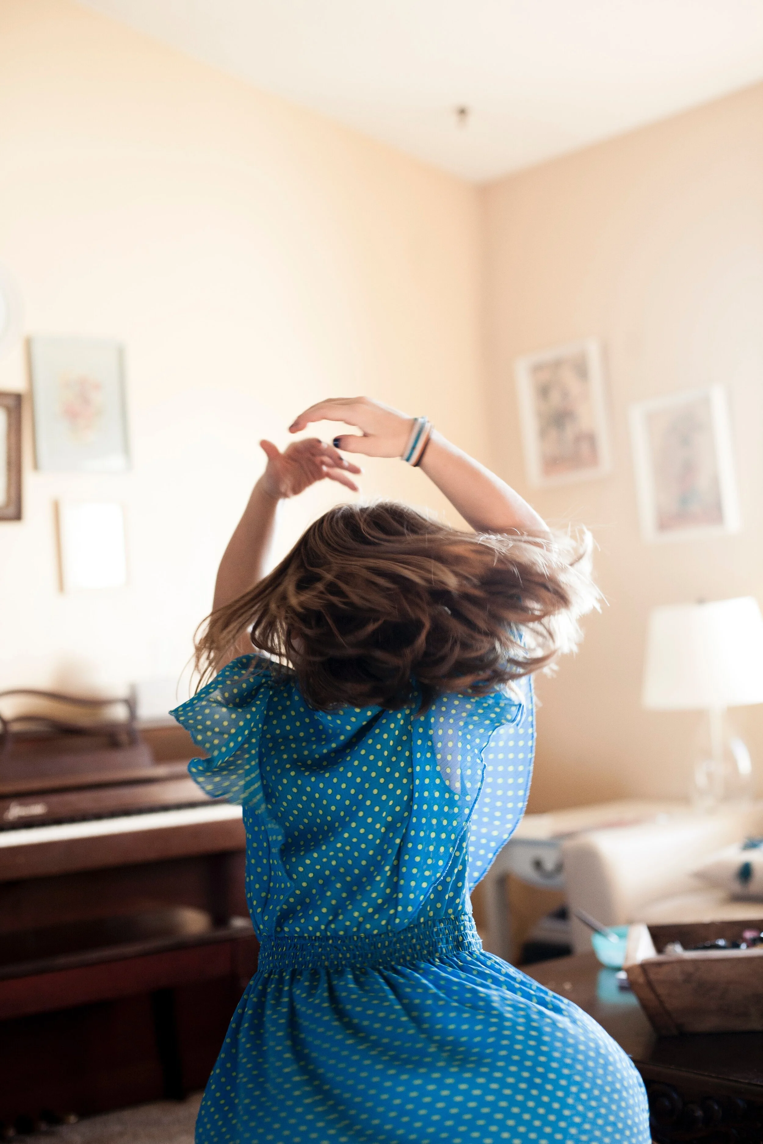 Photo by Laura Fuhrman on Unsplash “It was a normal Saturday morning at our house, and I pulled out my camera to document the happenings of our morning. My middle daughter put on some music and started dancing. The morning sun was shining through the windows beautifully as I caught her in mid twirl.”