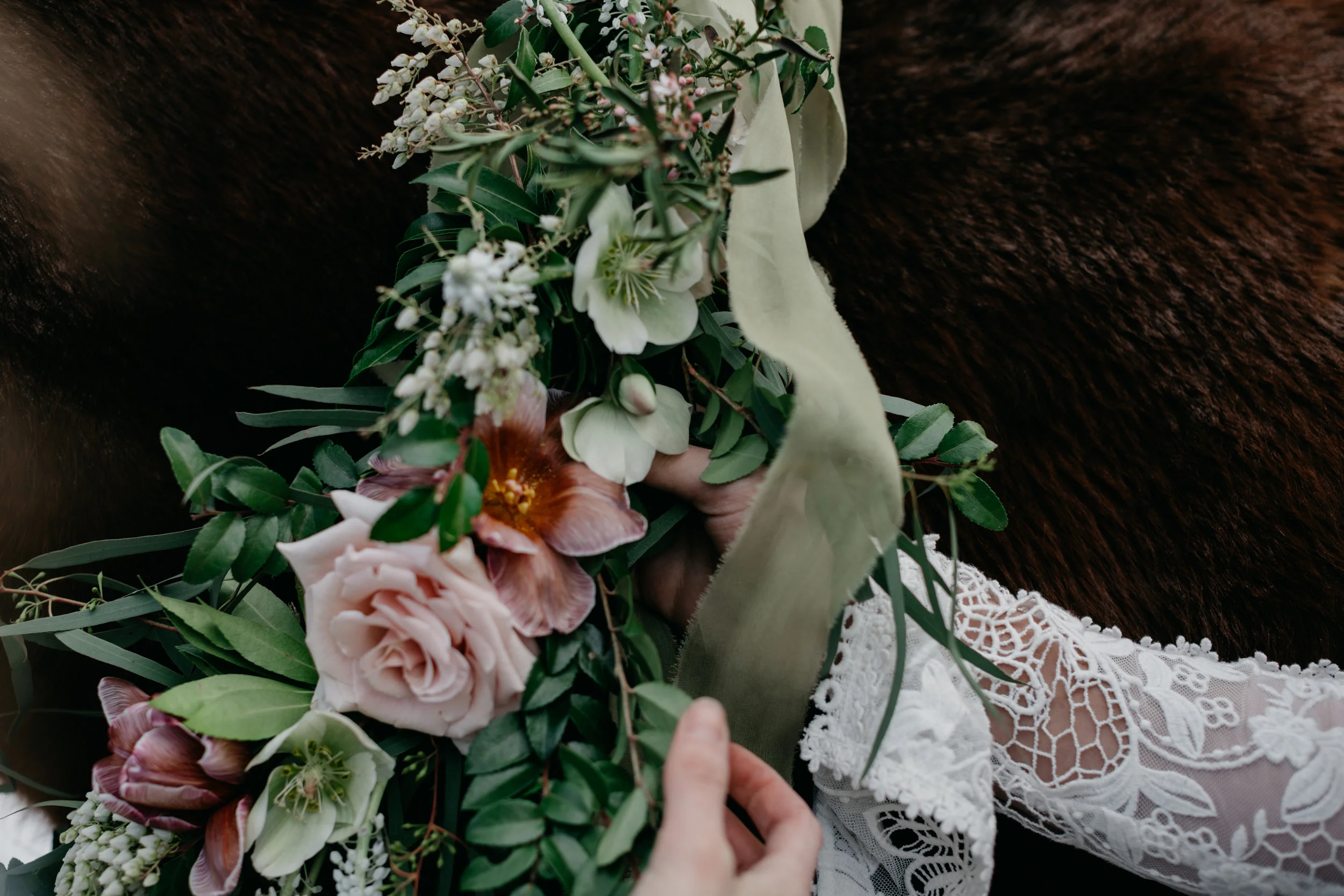 Floral Design by The Windflower Rosemarine Textiles chiffon ribbon in Pear Styling by The Revel Rose Calligraphy and Stationary by Plume and Proper Location: Venue3two Horse from Equine Assisted Development Nonprofit Photography by Arielle Teft Dress by Ali Nicole Bridal