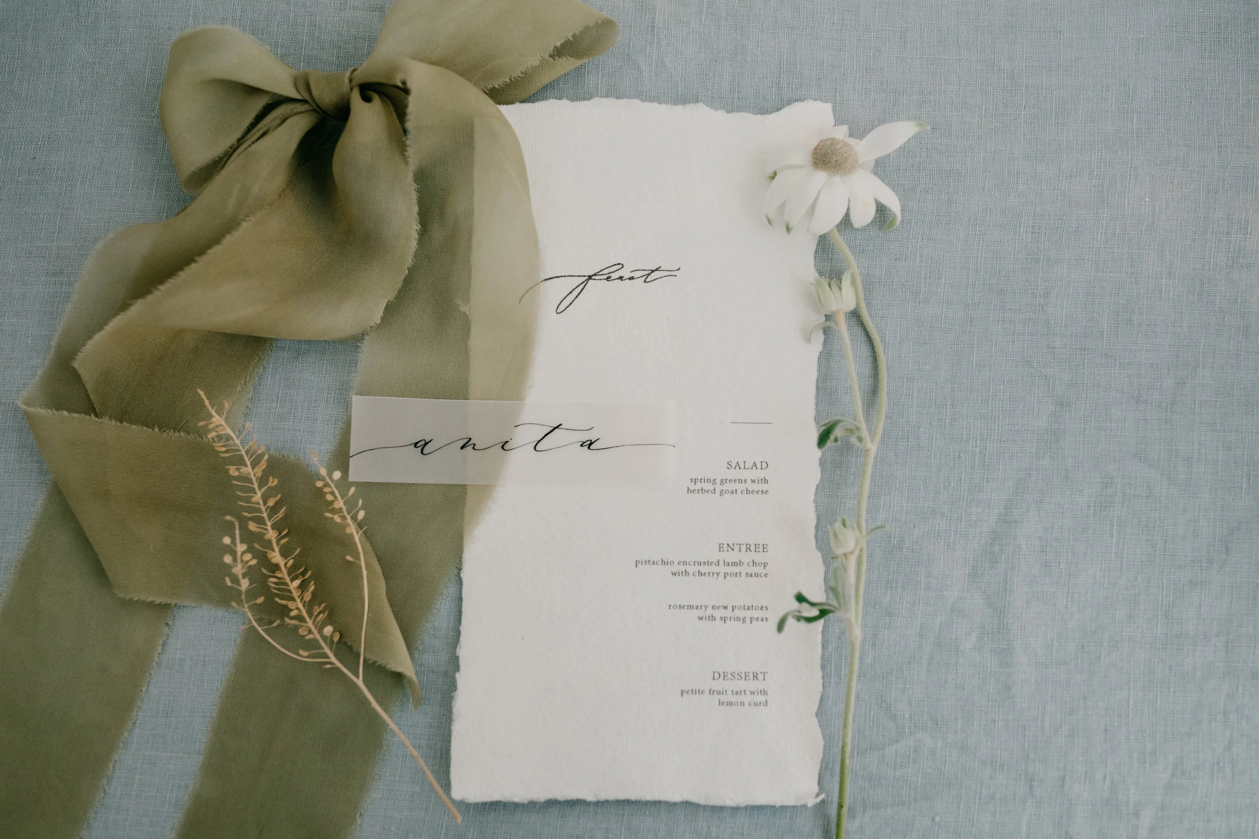 Floral Design by The Windflower Rosemarine Textiles chiffon ribbon in Pear Styling by The Revel Rose Calligraphy and Stationary by Plume and Proper Location: Venue3two Horse from Equine Assisted Development Nonprofit Photography by Arielle Teft Dress by Ali Nicole Bridal