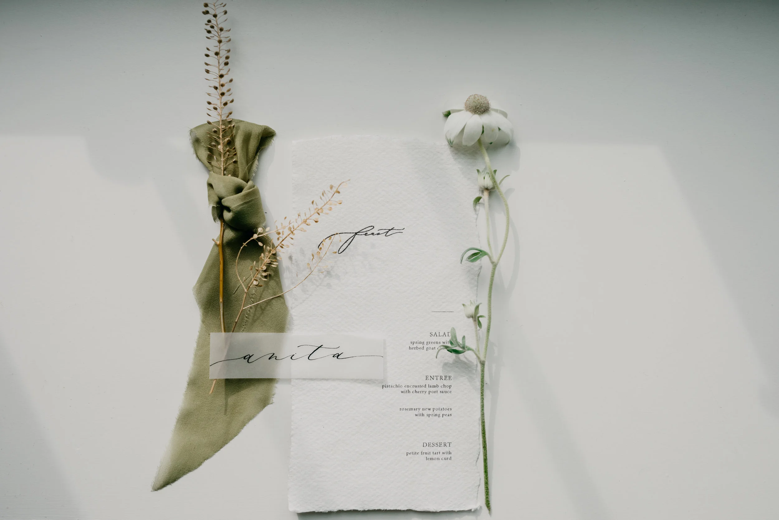 Floral Design by The Windflower Rosemarine Textiles chiffon ribbon in Pear Styling by The Revel Rose Calligraphy and Stationary by Plume and Proper Location: Venue3two Horse from Equine Assisted Development Nonprofit Photography by Arielle Teft Dress by Ali Nicole Bridal