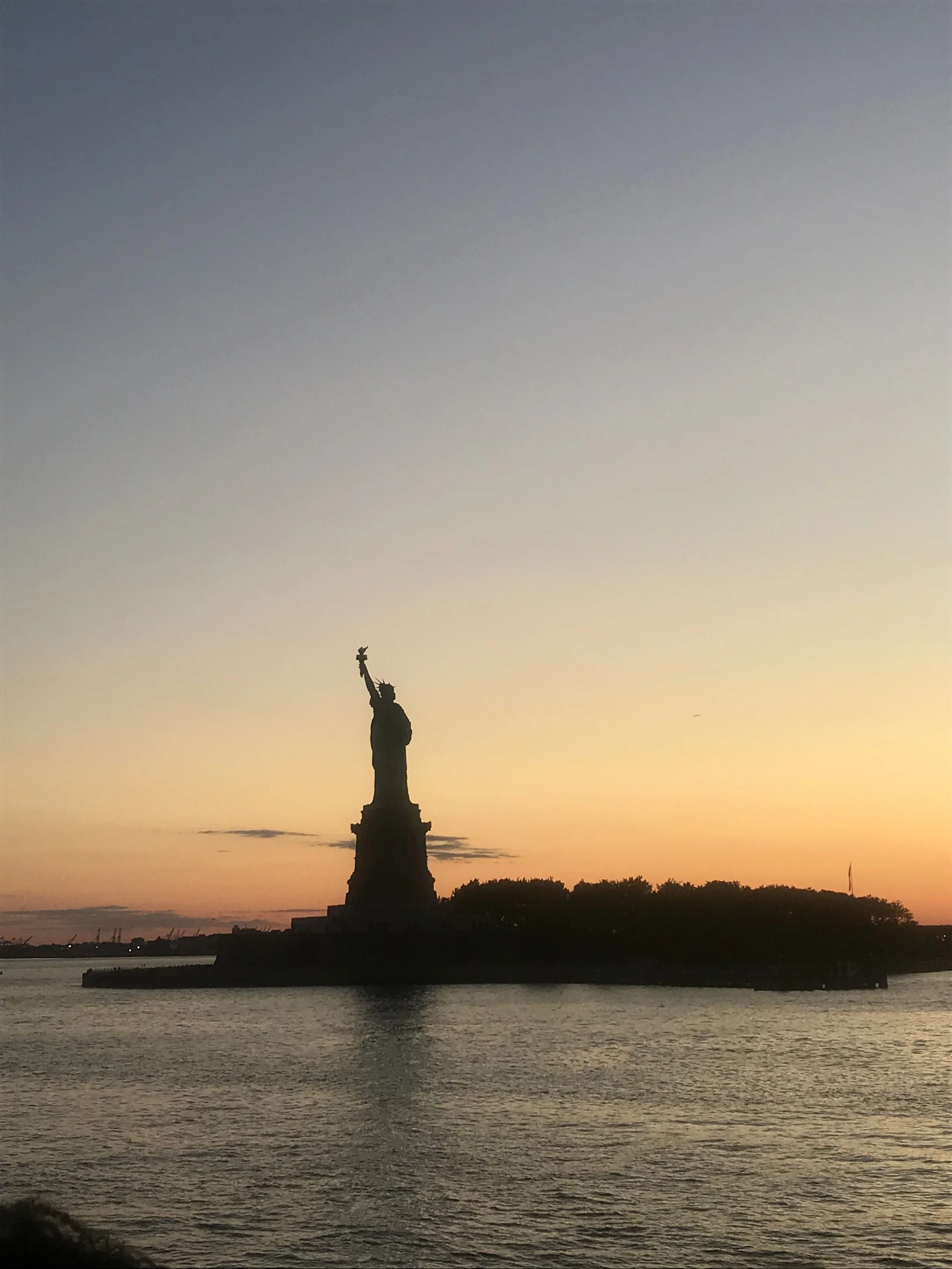 The Statue of Liberty at sunset from our sunset cruise.
