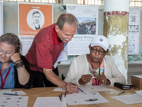 Teaching Artist, Linda Litteral (left), participated in a workshop at the exhibition. Photo: Peter Merts