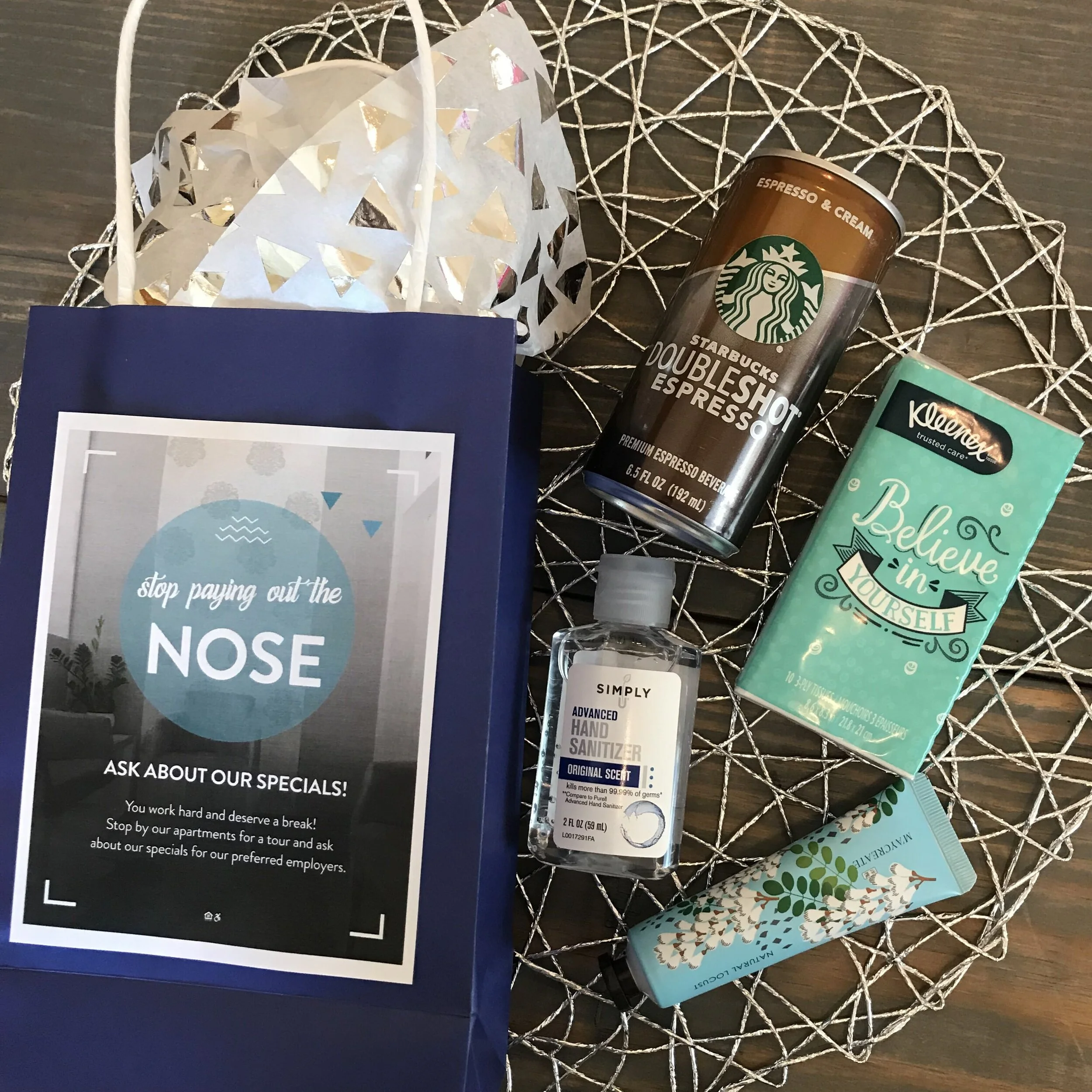 Gift Bags&nbsp;Put a couple of items in each gift bag - mix it up! Put a hand sanitizer with a first aid kit in one bag, in another, you can put a face mask and an energy bar/drink. Make them all a little different so they each get a special surprise.Insert a ¼ page flyer with a business card or customize a flyer with your community’s info.Add some tissue paper.