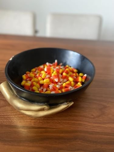 Stock+Photo+Hand+Bowl+Candy+Corn+(2).jpg
