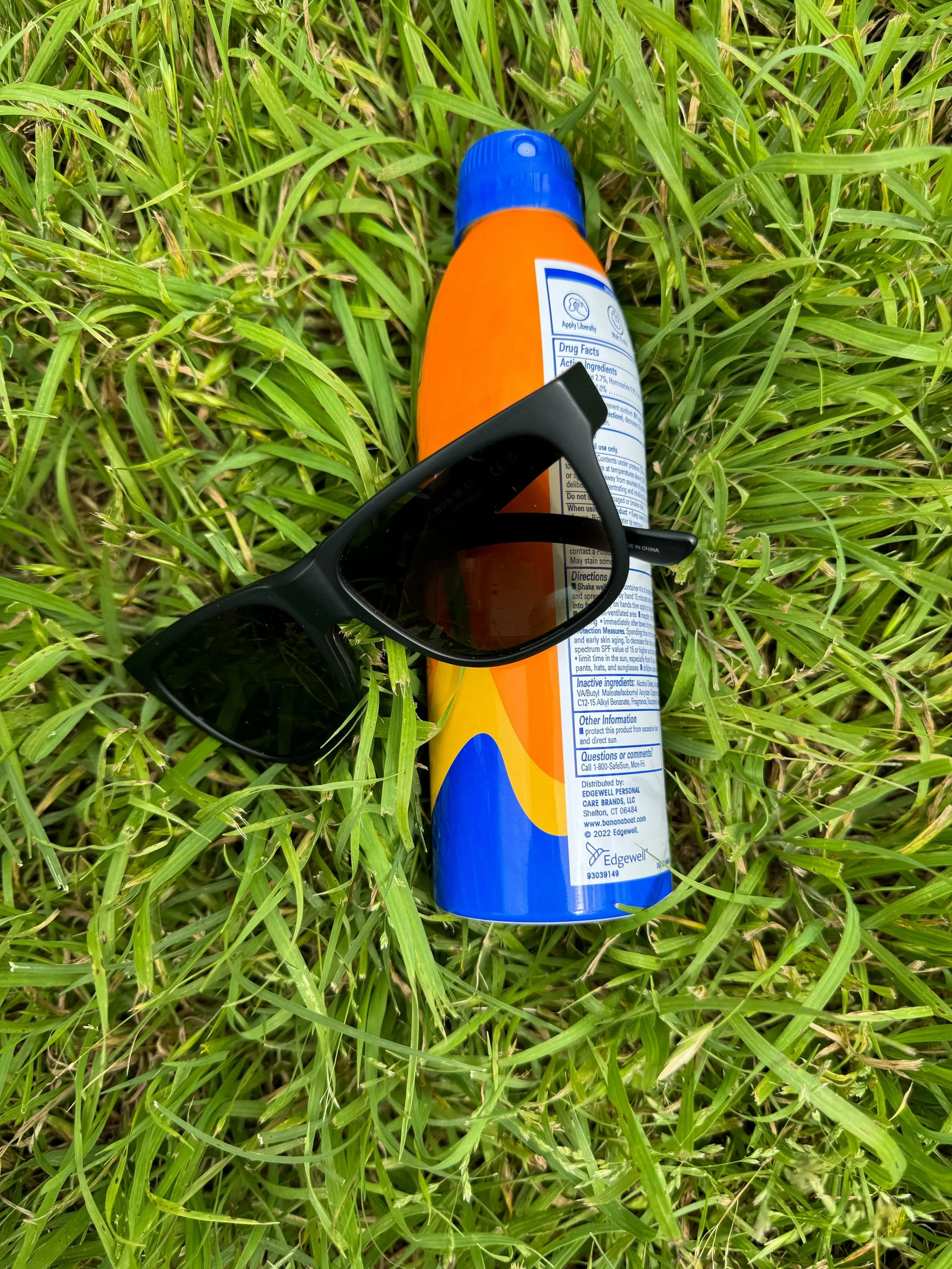 Stock Photo Sunscreen Glasses Grass (1).jpg