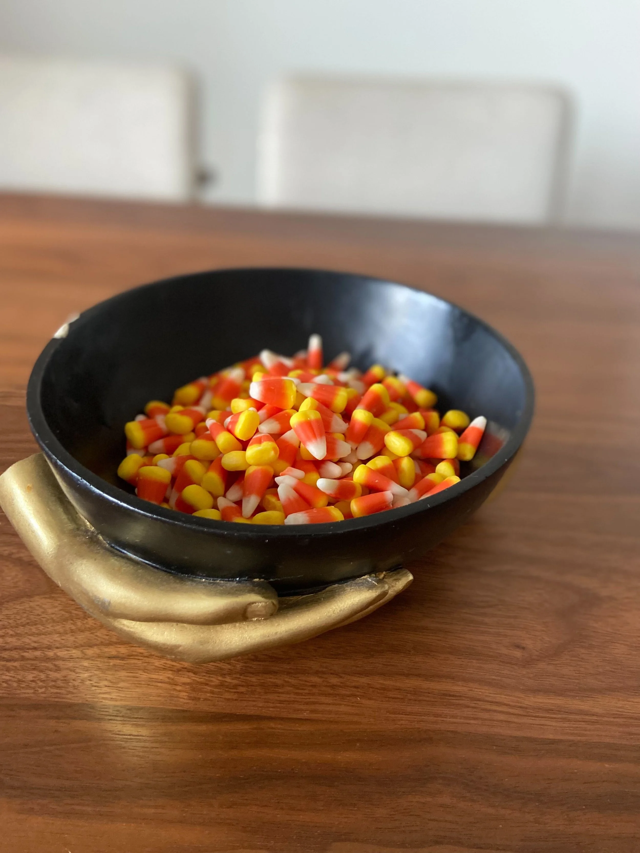 Stock_Photo_Hand_Bowl_Candy_Corn_(2).jpg