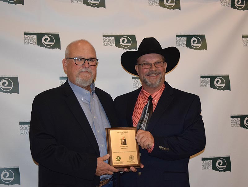 Dr. Dan Sebert (left), CEO-Executive Director of the National Watershed Coalition, was inducted into the Conservation Hall of Fame. (pictured with OACD president Jimmy Emmons)