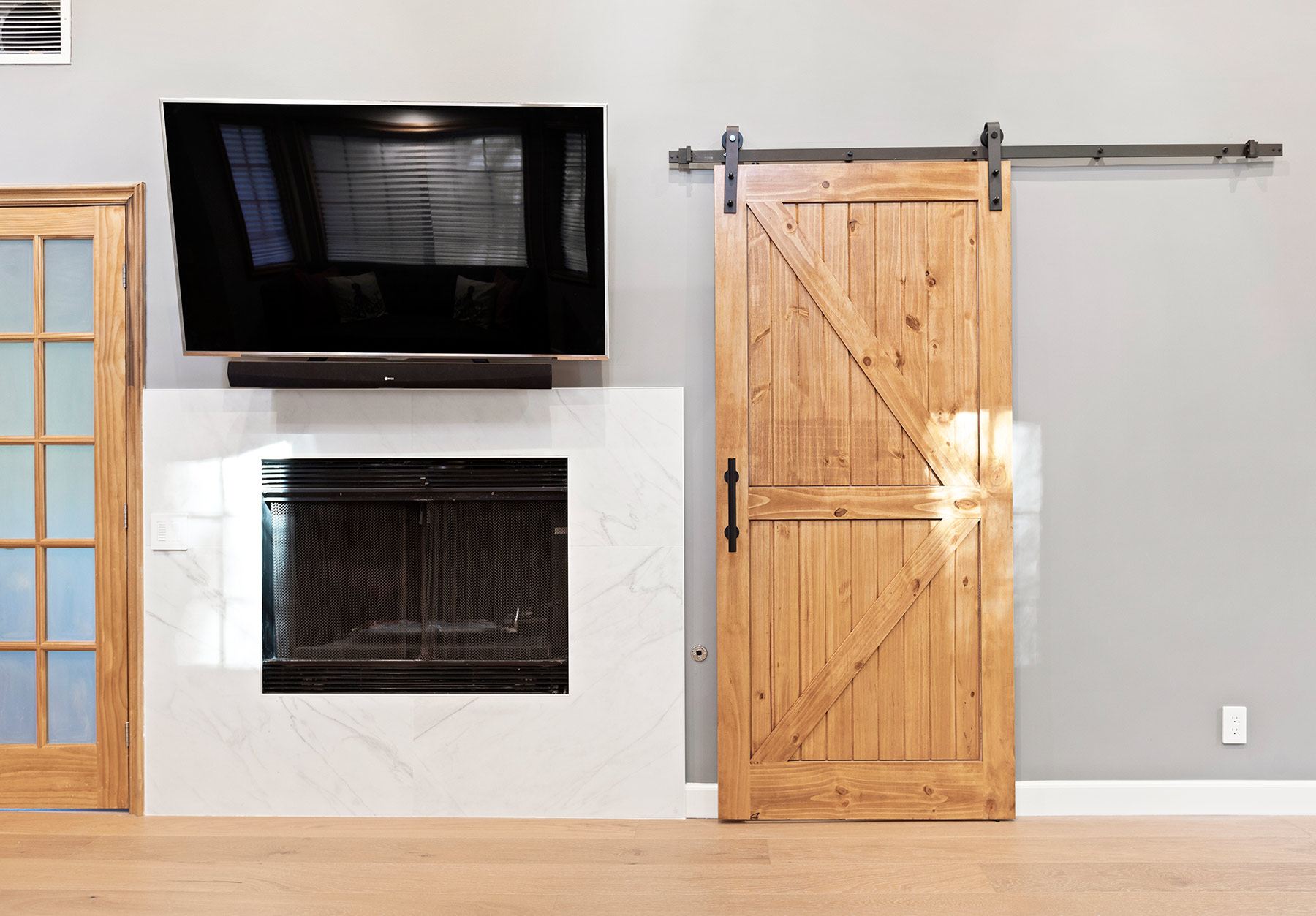 Barn door to master bathroom