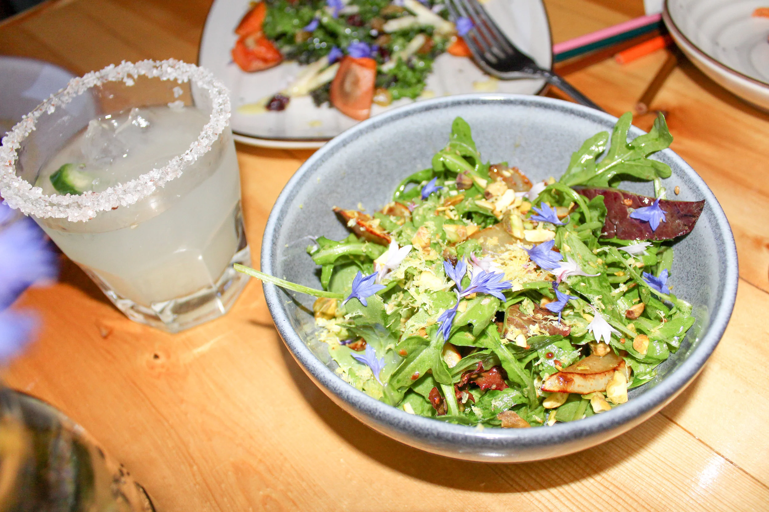 Arugula salad with poached pears, miso sesame vinagerette and spiced walnuts