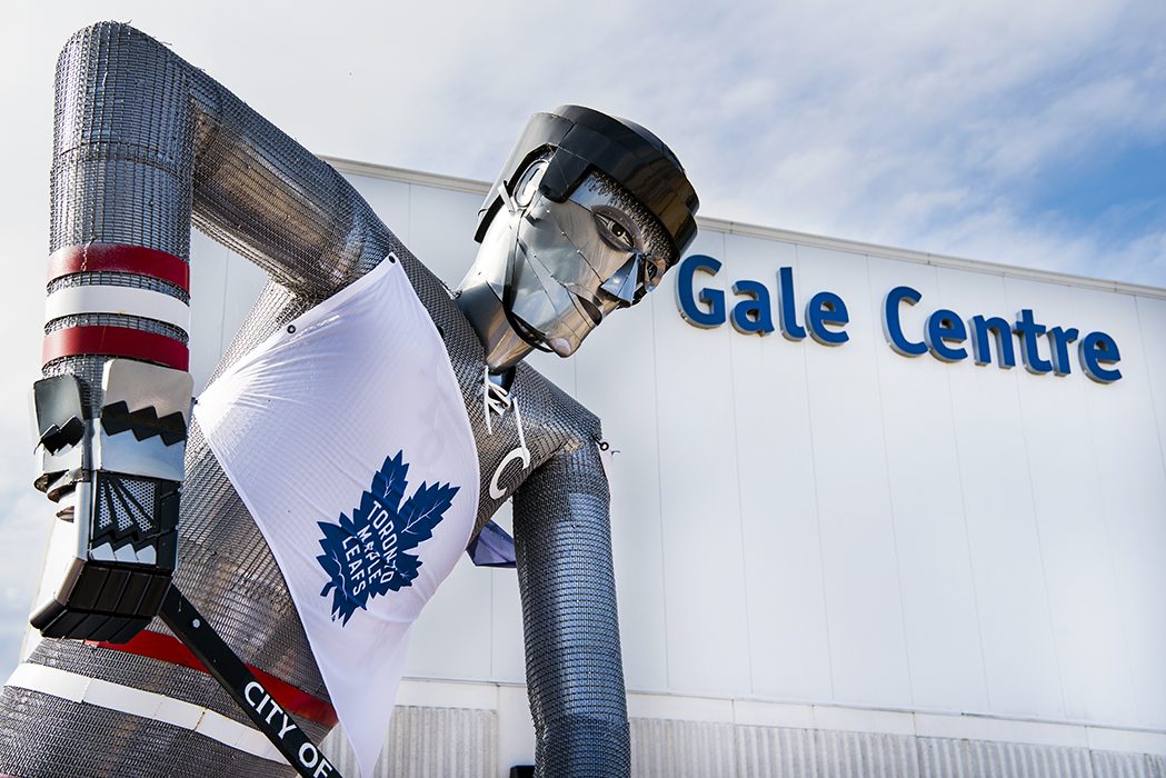 A statue standing outside of Niagara Falls' Gale centre, entitled "Blades of Steel," is outfitted with a Toronto Maple Leafs flag during the team's training camp.