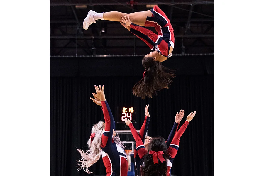 Brock University’s Cheer Team energized the crowd during halftime at the Meridian Centre.