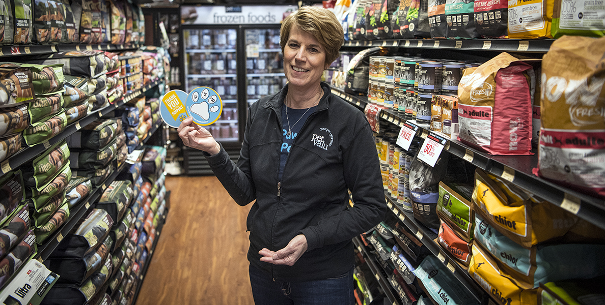Brigit Cardin, owner/operator of Pet Valu Welland, is asking customers to “buy a paw, help a pet” this month, with proceeds going towards two local charities. Photo by Alex Lupul