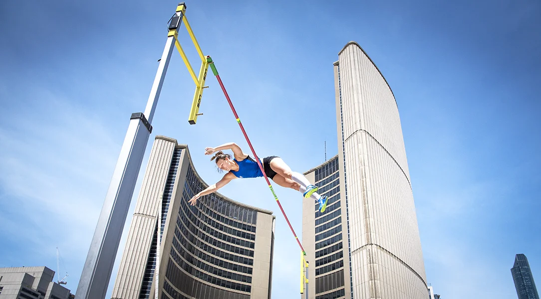 Carolina Carmichael reaches new heights outside of Toronto City Hall while competing in Athletics Canada’s Track & Field Takeover at Nathan Phillips Square.