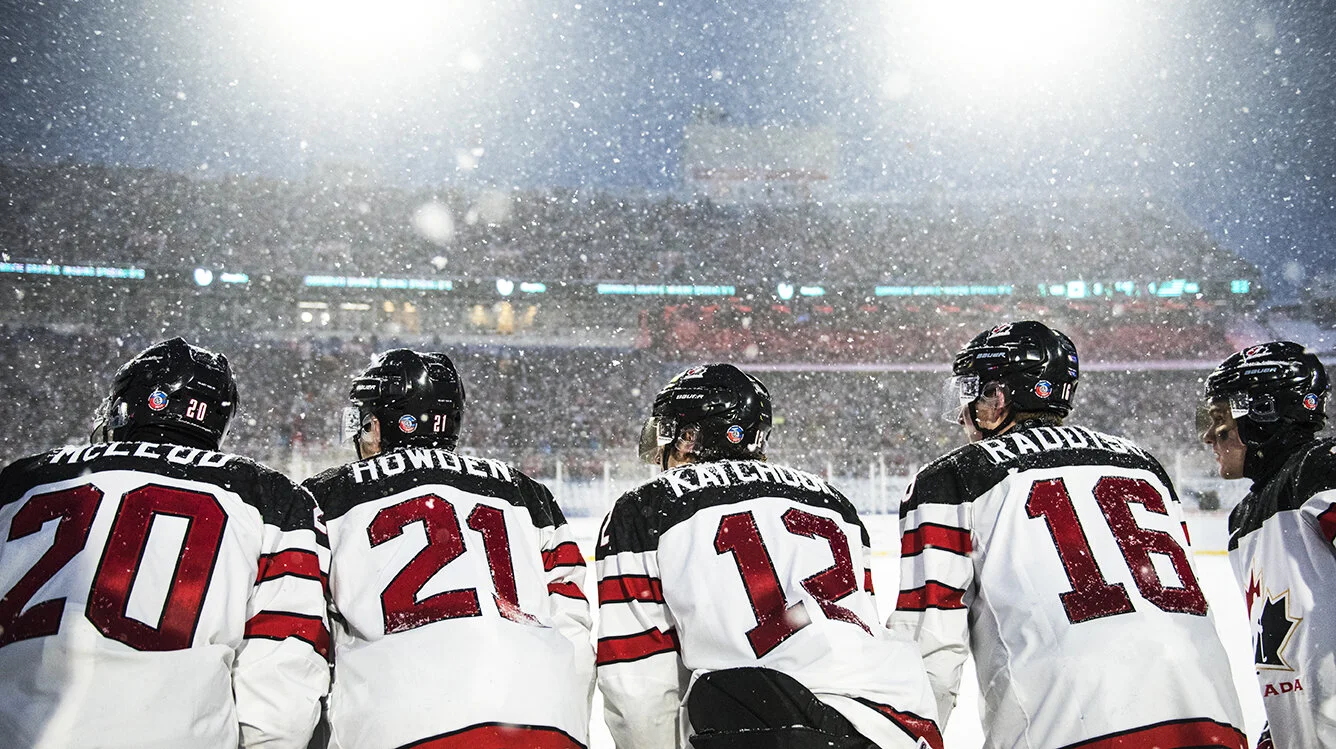 Team Canada’s (L-R) Michael McLeod, Brett Howden, Boris Katchouk, Taylor Raddysh and Robert Thomas watch from the bench during the 2018 World Junior Championship’s outdoor game against the United States.