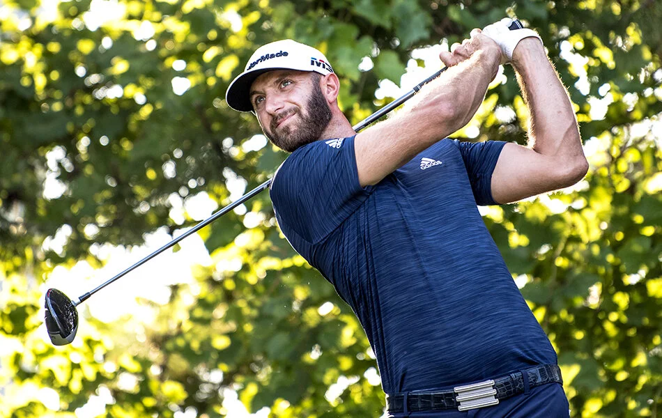American golfer Dustin Johnson tees off from the sixteenth tee at the 2018 RBC Canadian Open.