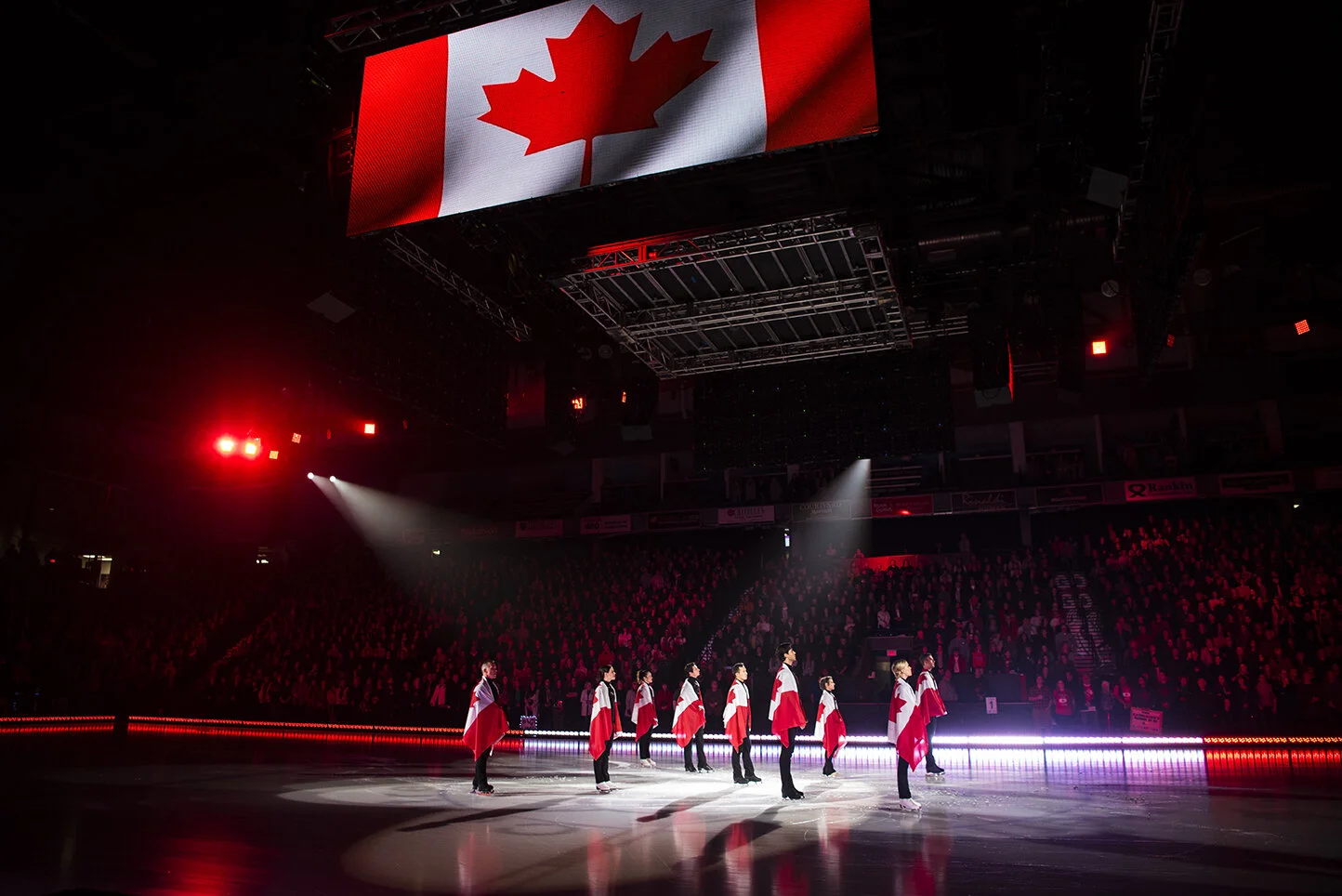 Canadian figure skaters stand for “O Canada“ before a Thank You Canada Tour performance at the Meridian Centre in St. Catharines, Ont.