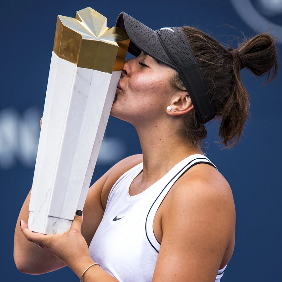 Bianca Andreescu kisses the Rogers Cup winner’s trophy after her win against Serena Williams on Sunday, Aug. 11, 2019. Andreescu is the first Canadian to win the tournament in 50 years.