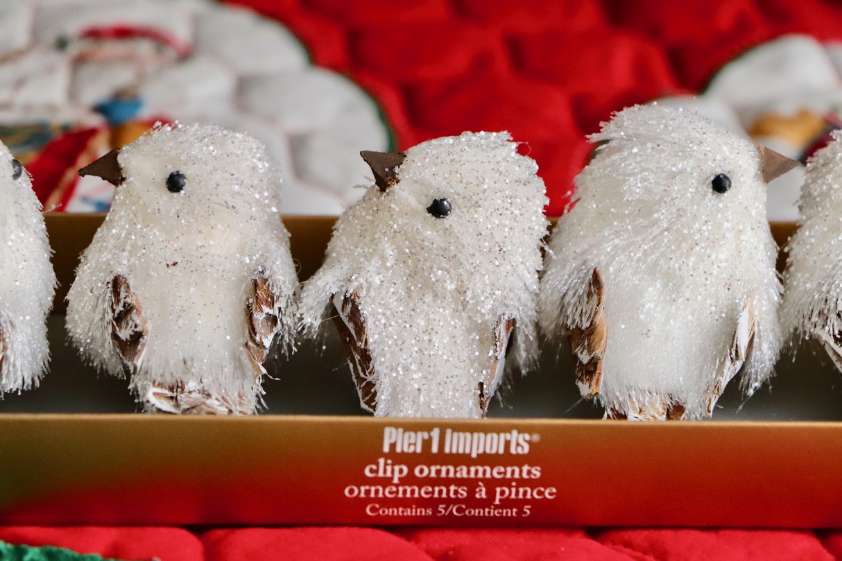 These little birds from Pier1 Imports are one of my favourite ornament sets. I bought these several years ago, but I kept the original boxes! Photo by: Lighter Side Interiors