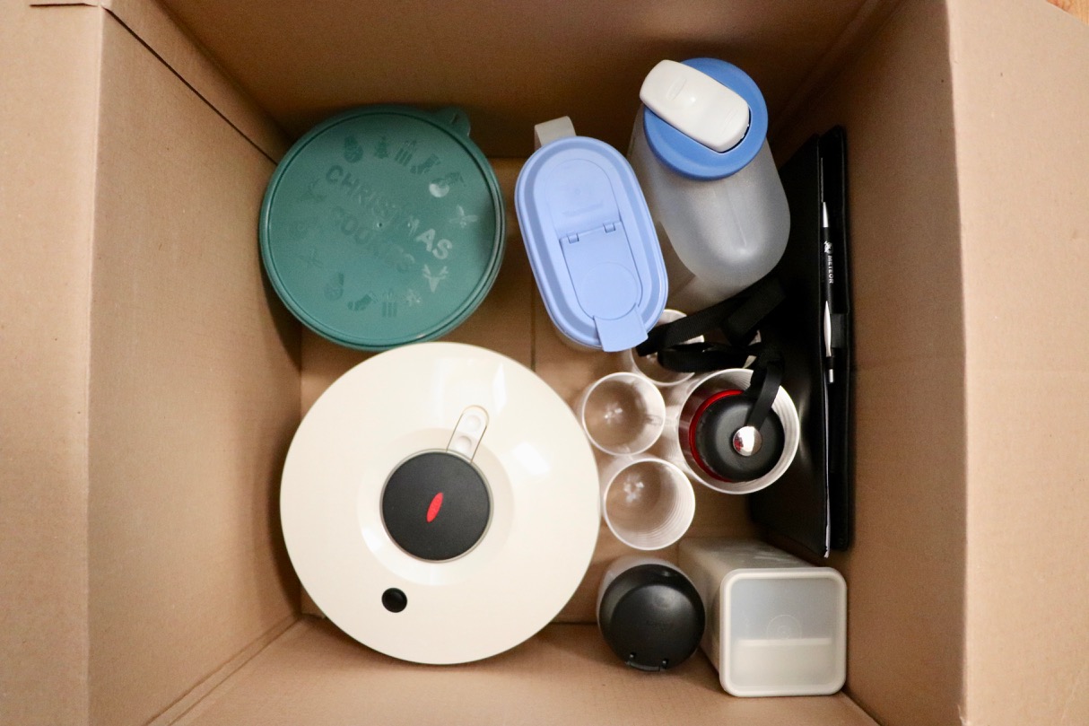 Kitchen items in the donations box. The box is fulling up! Photo by: Lighter Side Interiors