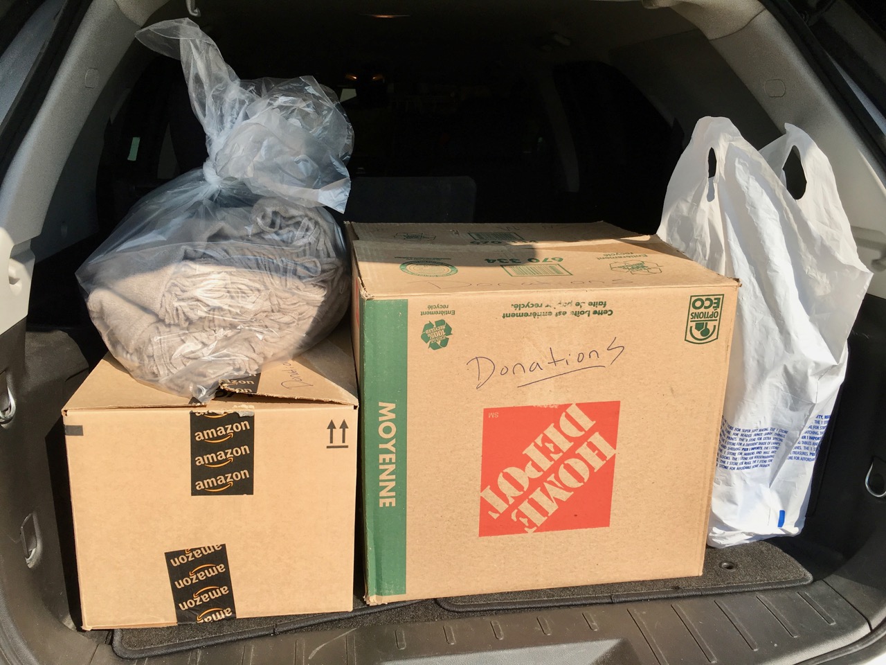 Donations loaded up in the vehicle and ready to go to charity! Photo by: Lighter Side Interiors