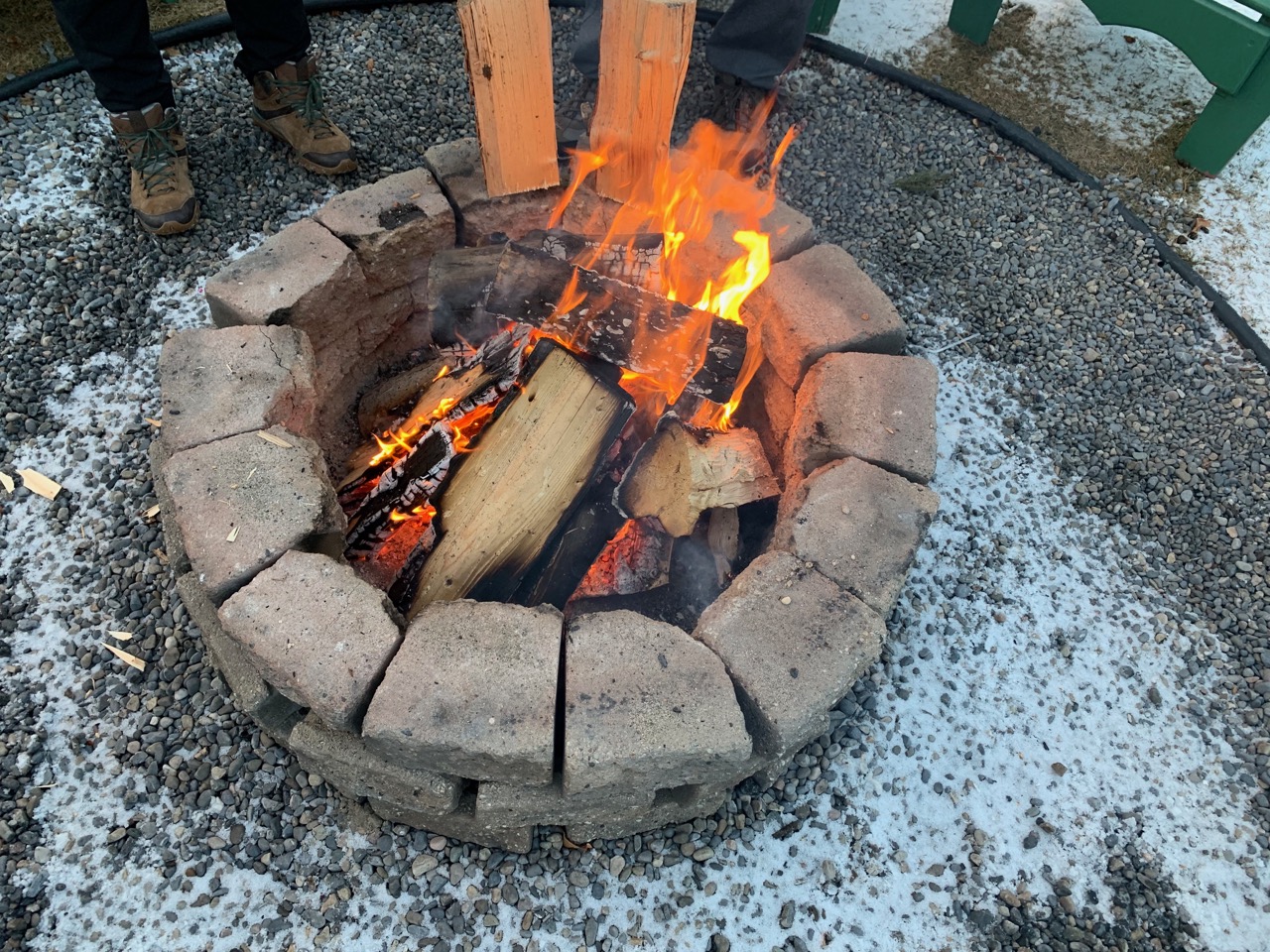 Warm your hands at the outdoor fire pit! Photo by: Lighter Side Interiors