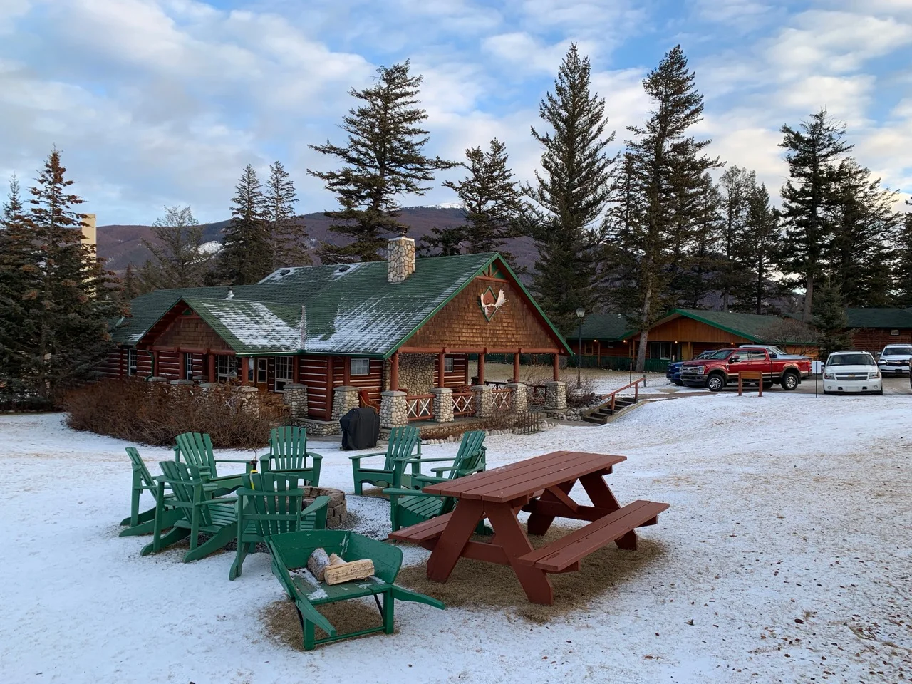 Fire pit and picnic table on the grounds of the Fairmont Jasper Park Lodge! Photo by: Lighter Side Interiors