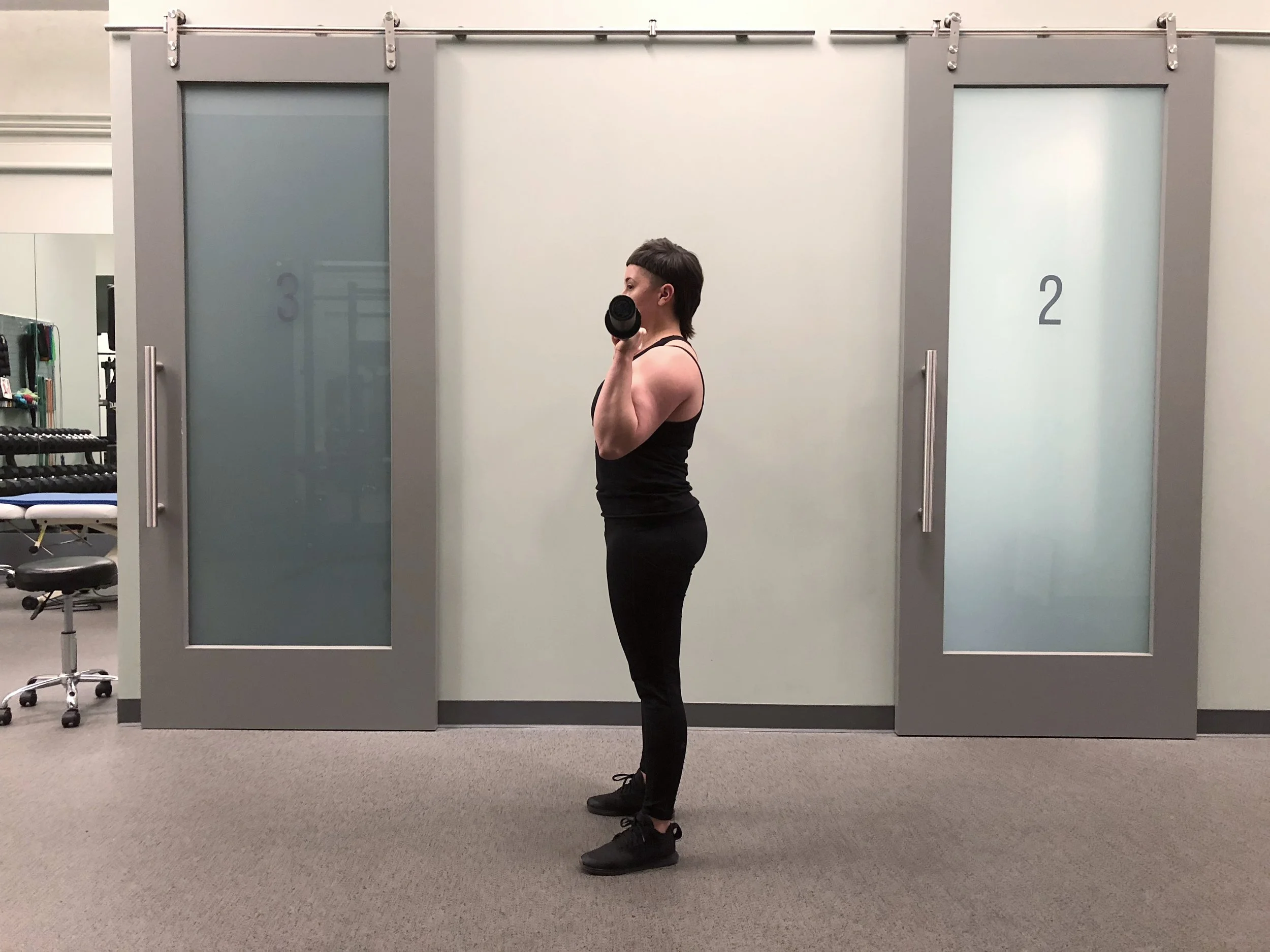 Notice my knees are NOT bent, my elbows are stacked under the bar with my wrists neutral and the bar is not resting on my chest or shoulders.