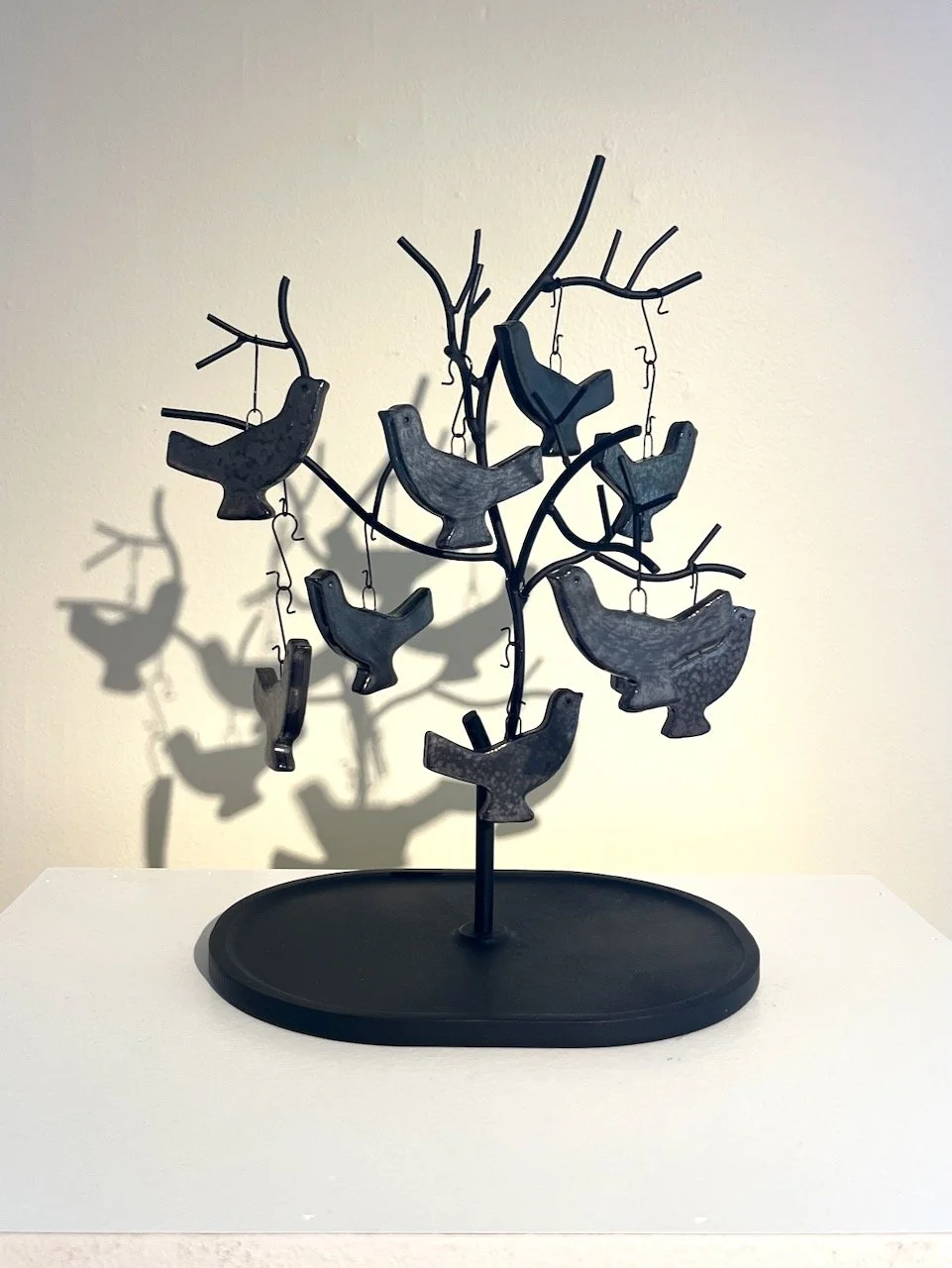  Gülnar Babayeva  Peace Keeper(s), 2026&nbsp;  Ceramic, metallic glaze, wire 2” x 3” each 