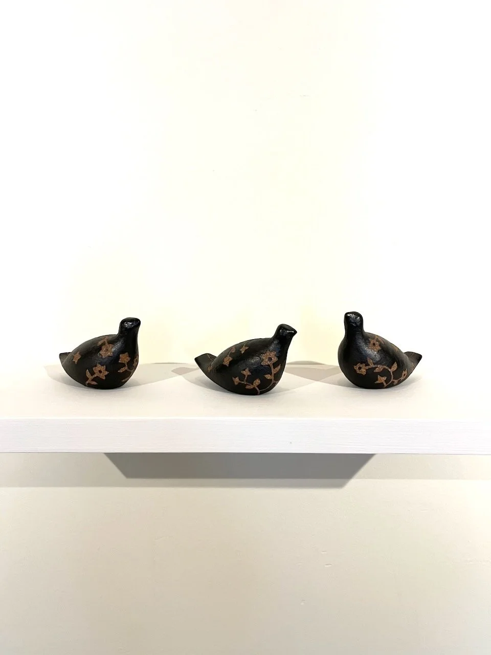  Patricia Court&nbsp;  Flora Bird I, II &amp; III, 2026&nbsp;  Ceramic (black slip on red clay)&nbsp;  approx. 4” x 2.5” x 2.5” each 