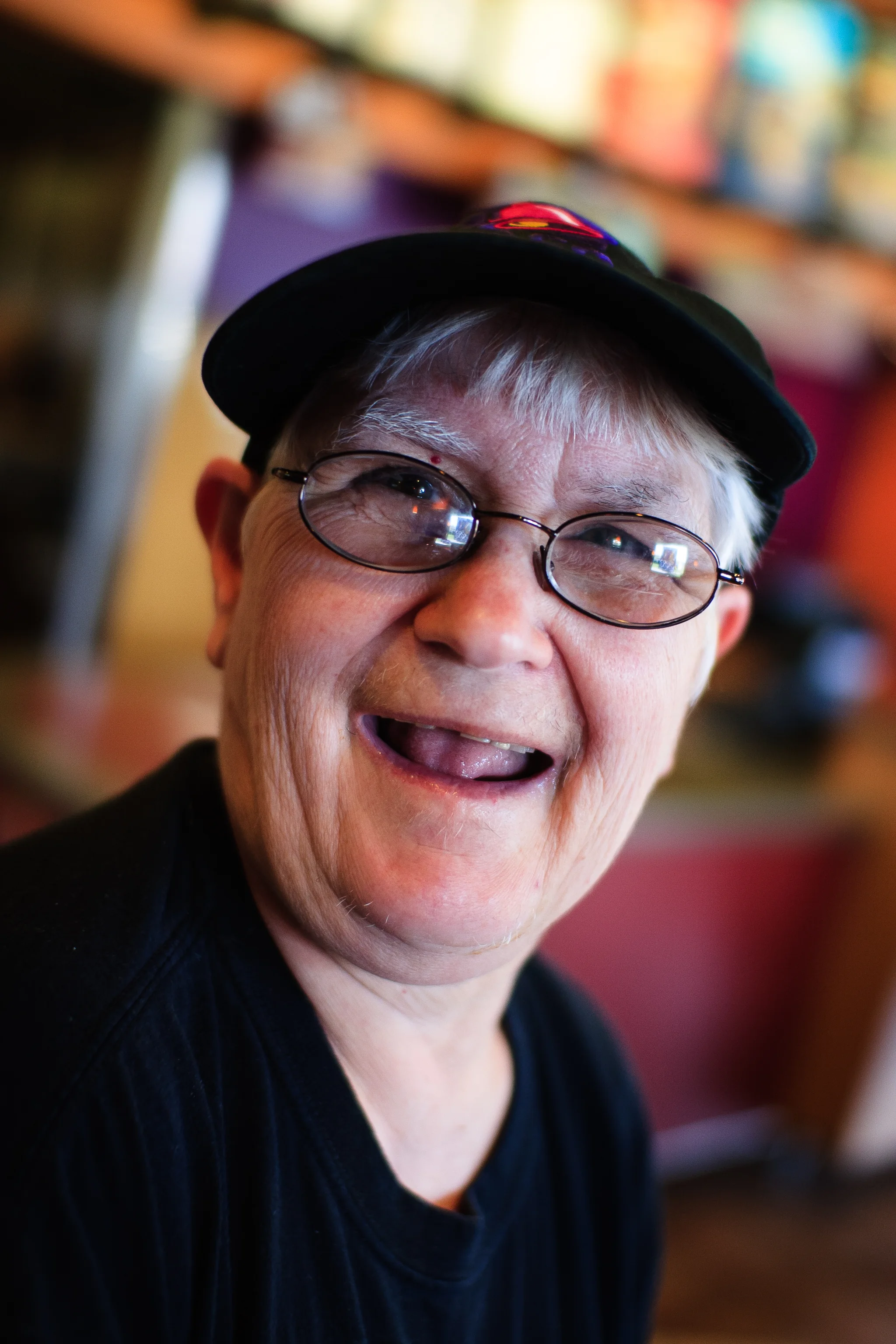 Portrait of woman with grey hair working at Taco Bell