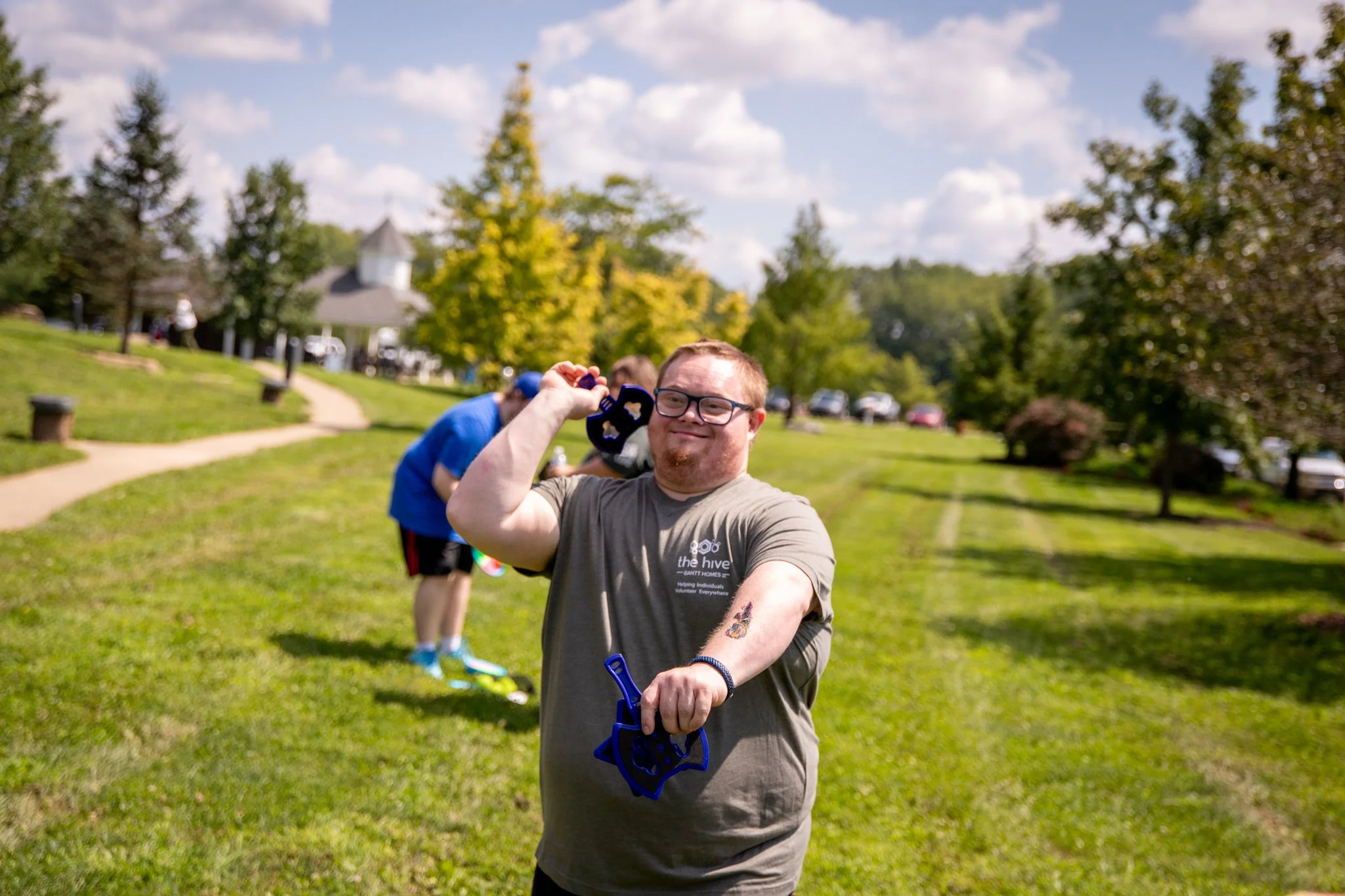 young man throwing fake axe