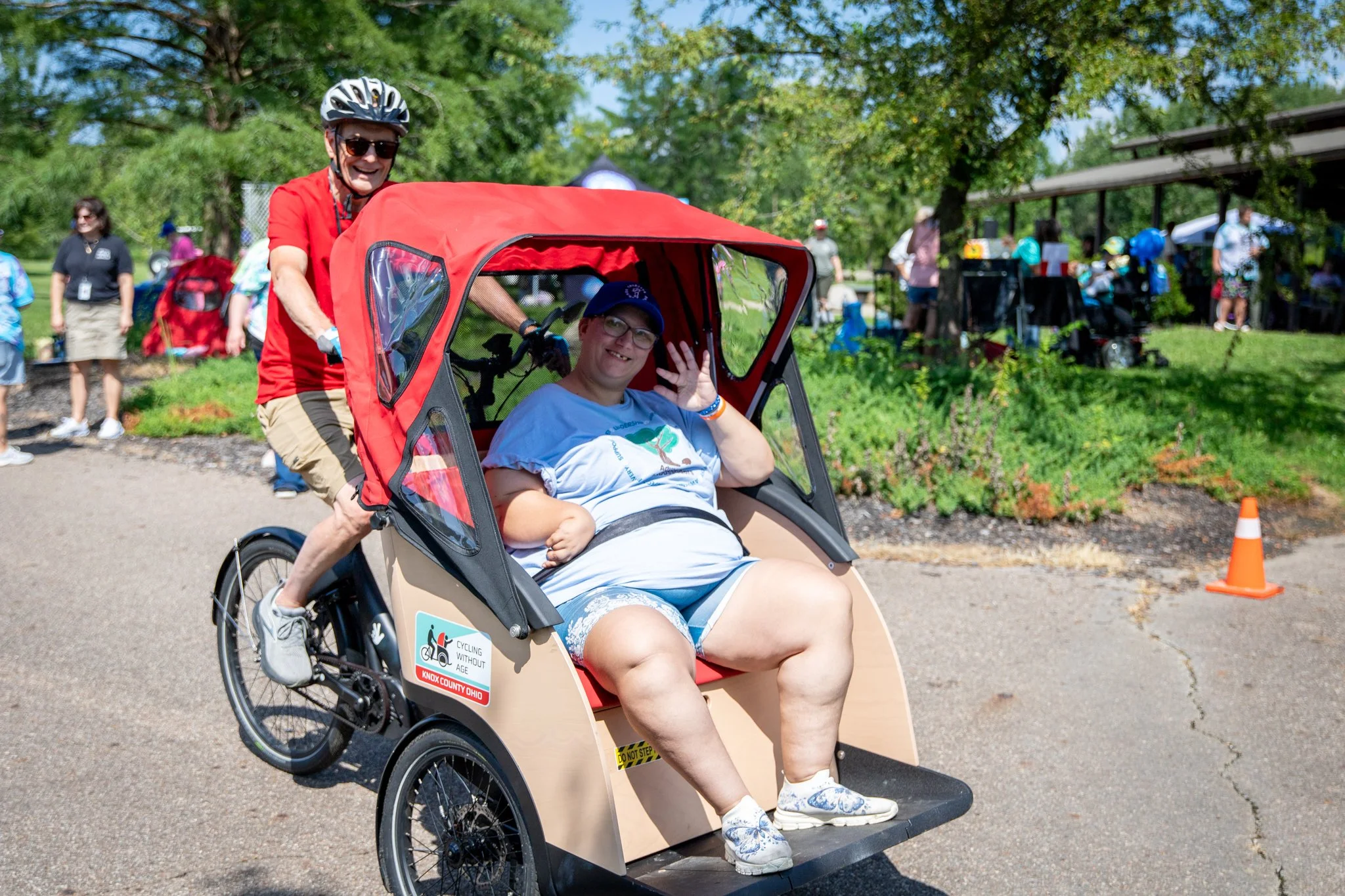 young woman riding on a happy spokes bike