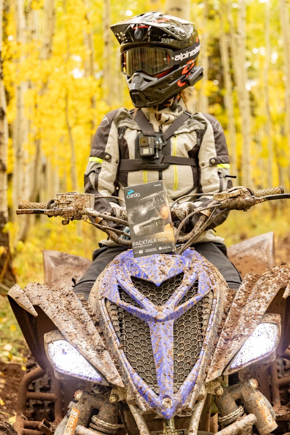 Anastasia Lianova modeling Cardo Packtalk Edge on a Yamaha YFZ450R