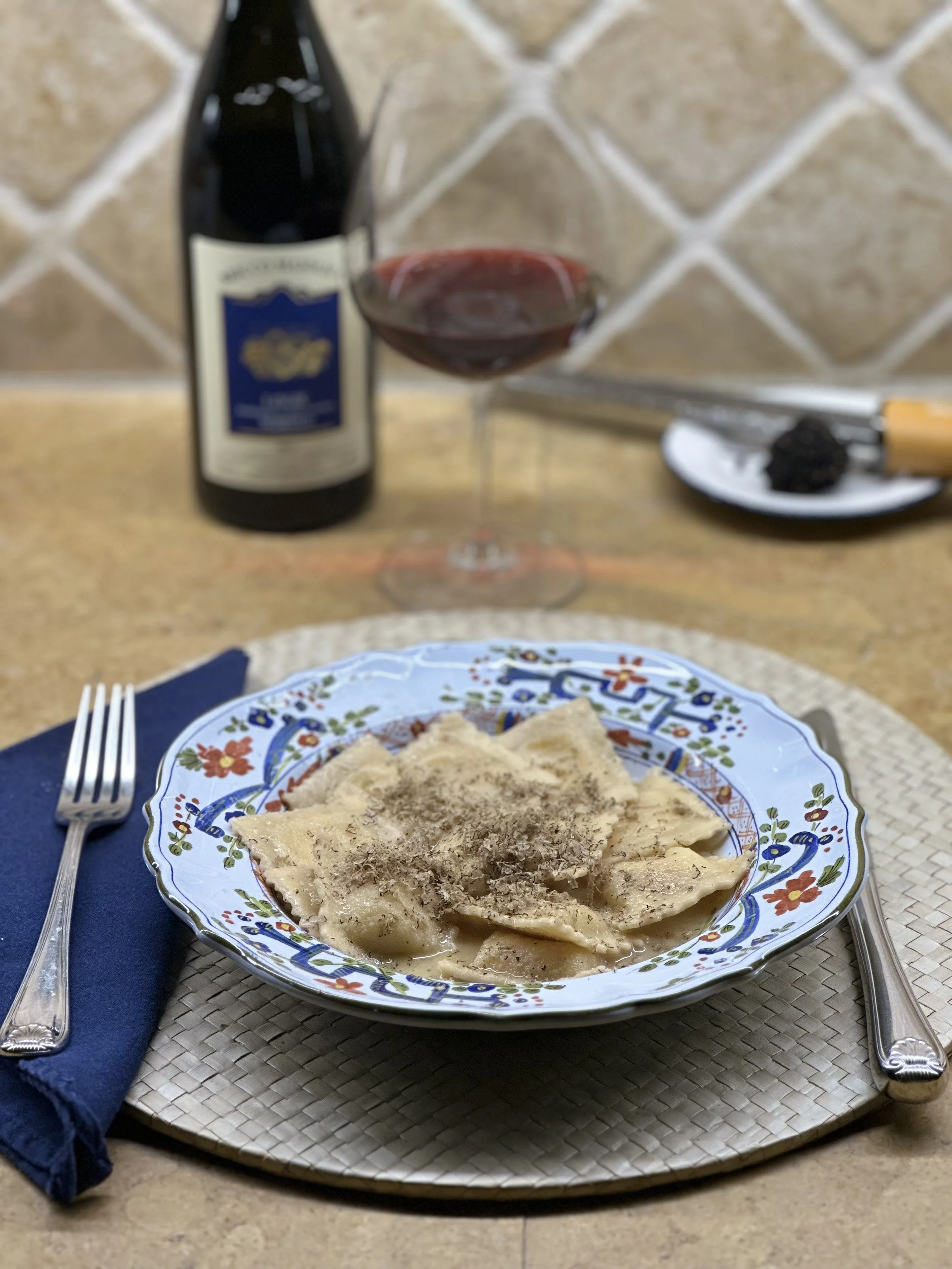 Cheese Ravioli with fresh Black Summer Truffles 