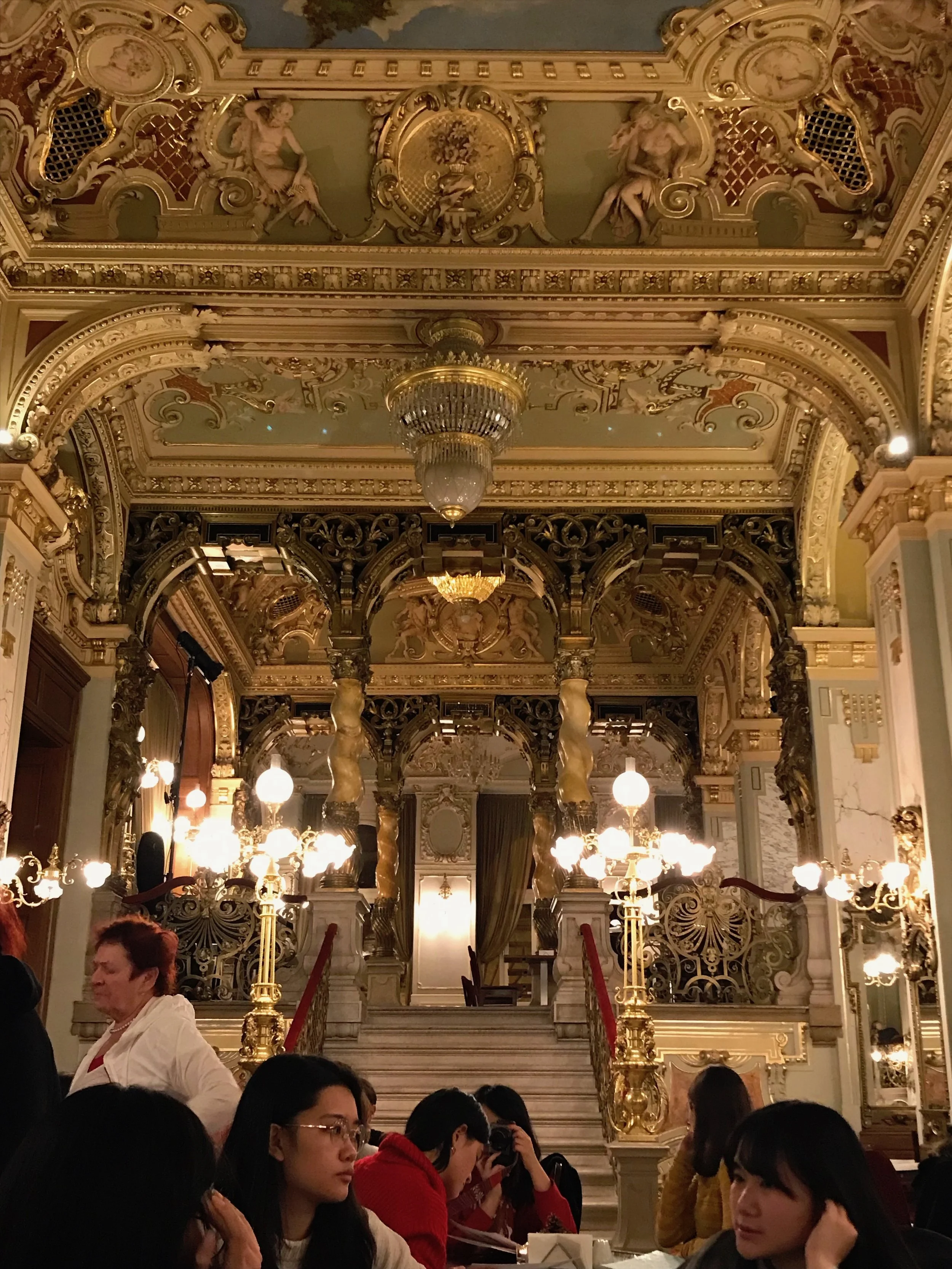 The gloriously ornate interior of the New York Cafe