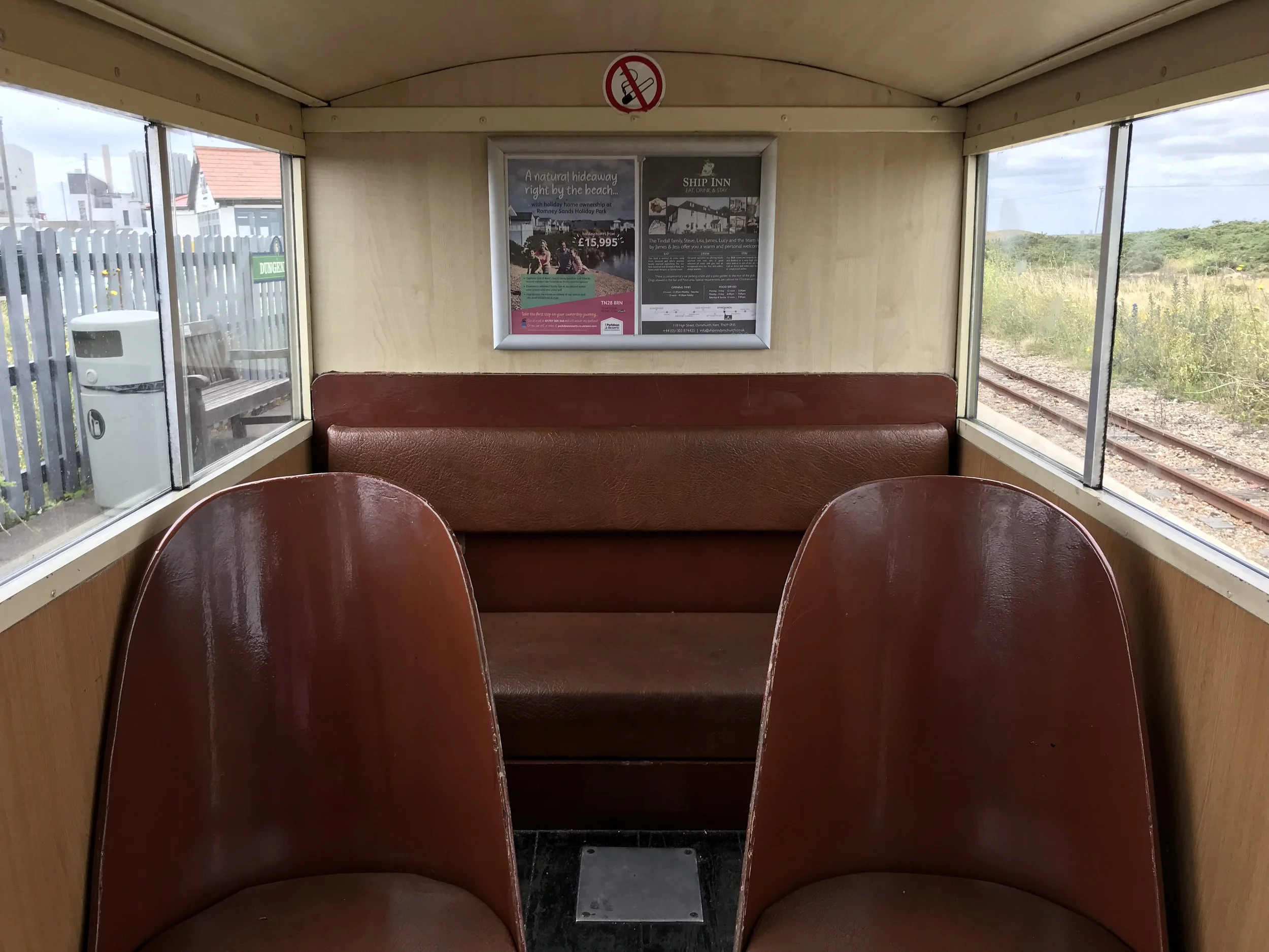 The carriages on the one-third size steam trains are just two seats wide.