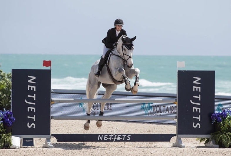 Misty riding Snoopy in the Miami Beach Longines Global Champions Tour this year.
