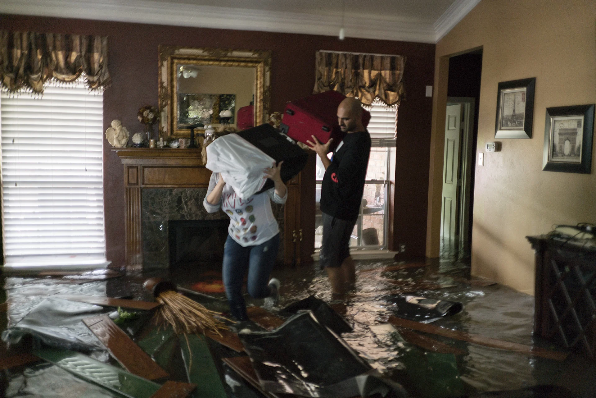 Carmen and her companion gathering their belongings.